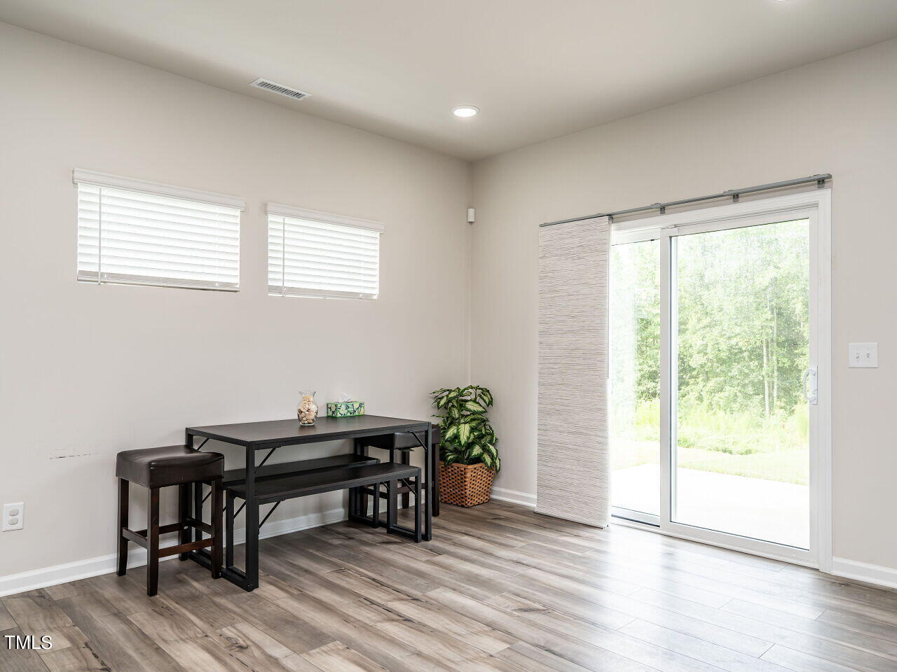 633 Embrun Run Wendell, NC 27591 - Photo 9 of 32 a view of a workspace with furniture and a window