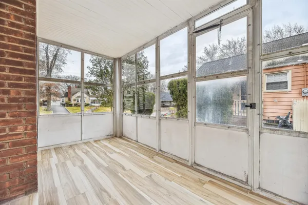 a view of a room with a large window
