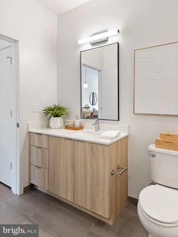 a kitchen with stainless steel appliances granite countertop a stove and a microwave