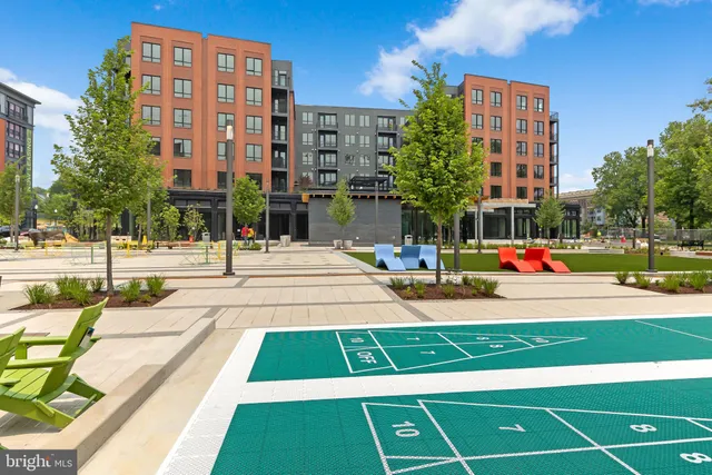 a front view of building with outdoor seating