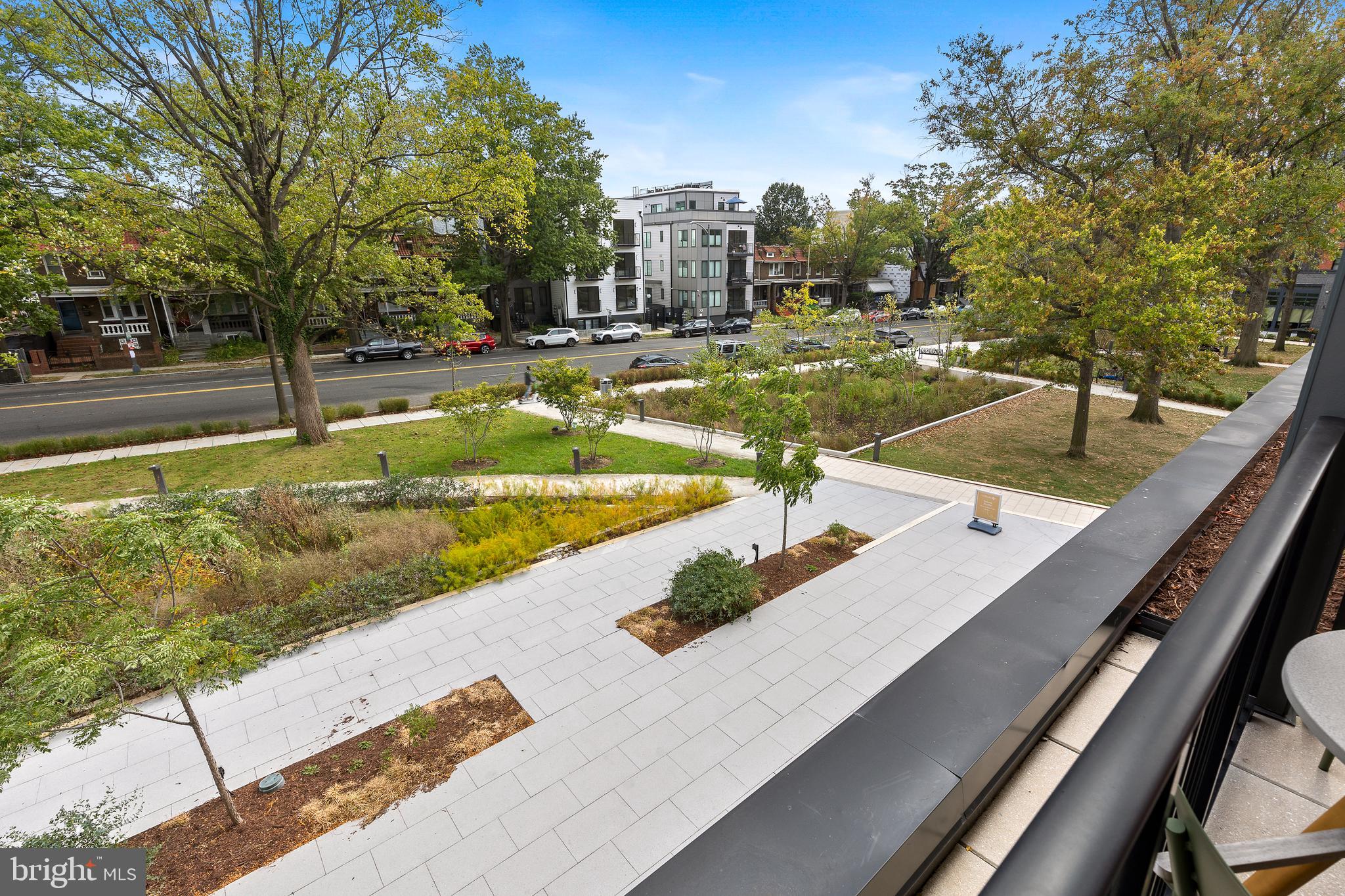 7175 12th Street Northwest, Unit 405 Washington, DC 20012 - Photo 6 of 63 a view of a swimming pool with a yard