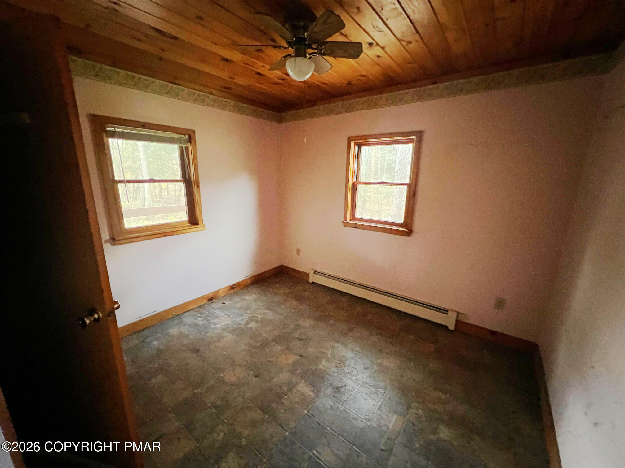 2564 Hills Creek Lake Road Wellsboro, PA 16901 - Photo 12 of 26 a view of an empty room and window