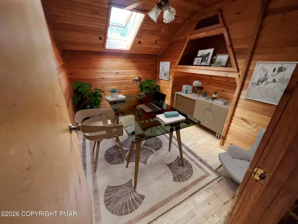 a view of livingroom with fireplace and furniture