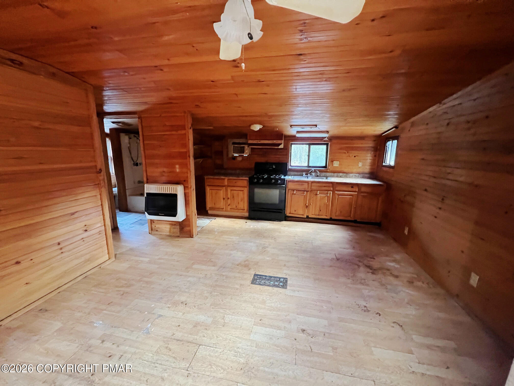 2564 Hills Creek Lake Road Wellsboro, PA 16901 - Photo 21 of 26 a view of livingroom with fireplace and furniture