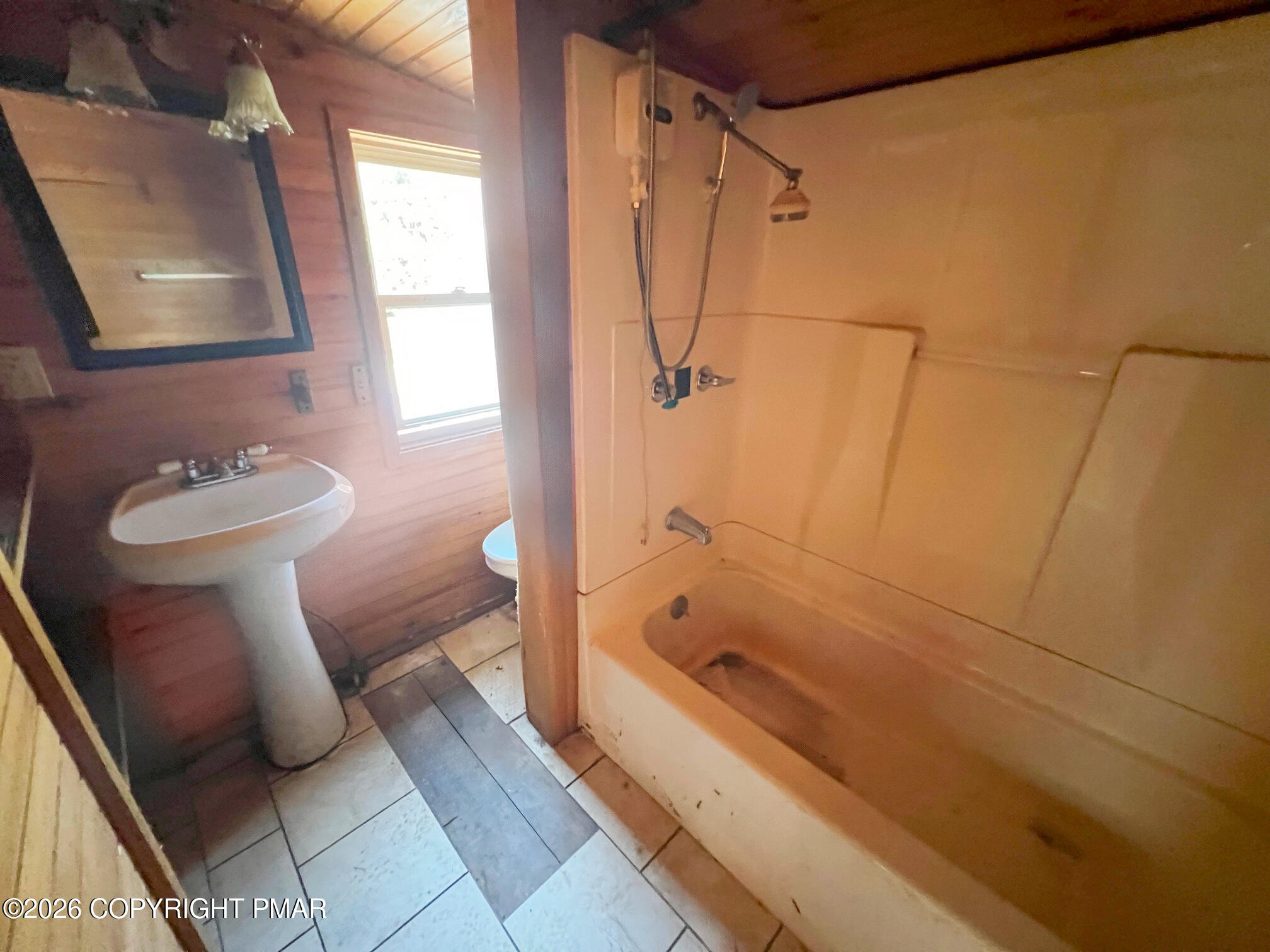 2564 Hills Creek Lake Road Wellsboro, PA 16901 - Photo 26 of 26 a bathroom with a shower and a sink