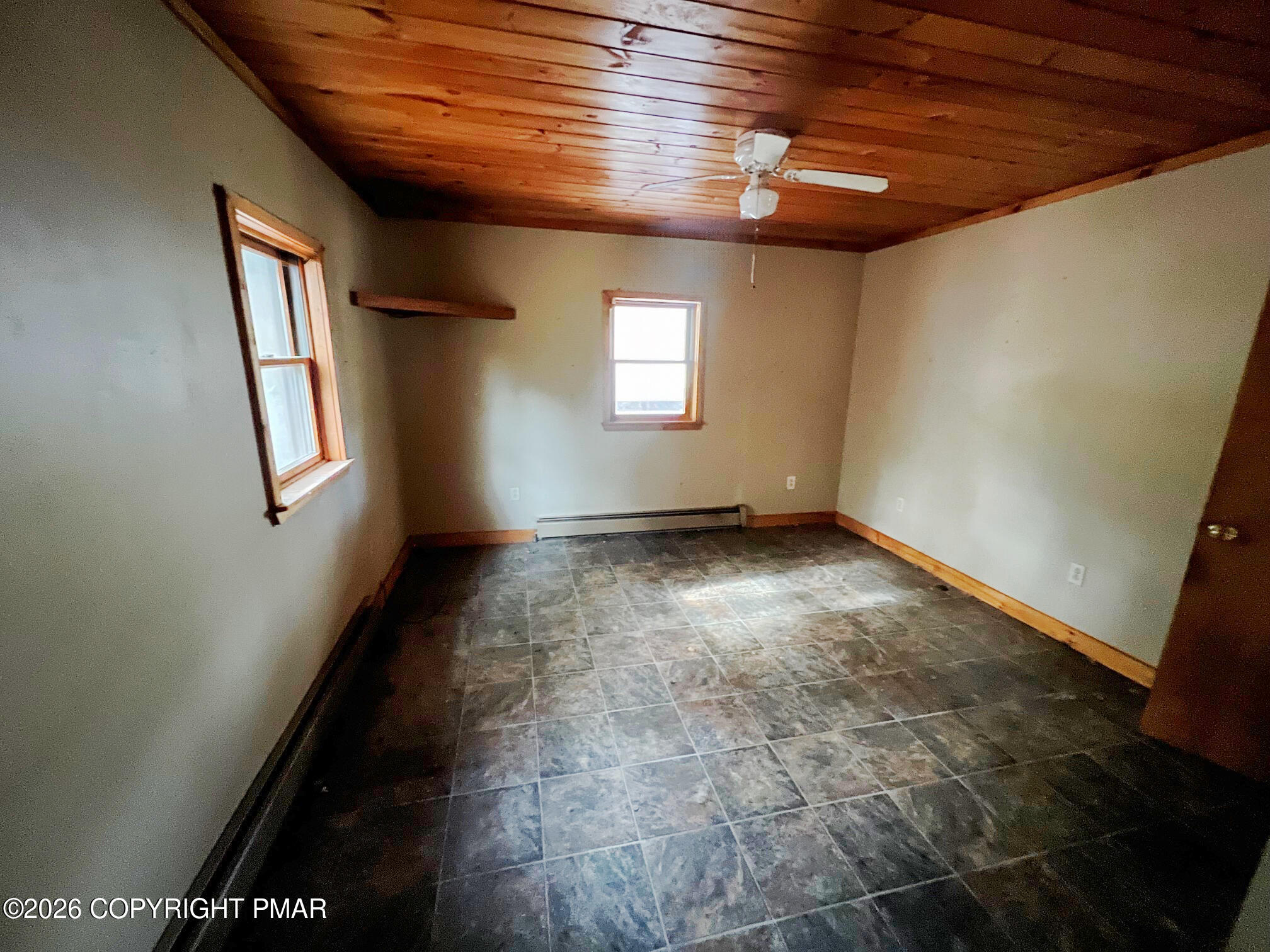 2564 Hills Creek Lake Road Wellsboro, PA 16901 - Photo 8 of 26 a view of an empty room with a window