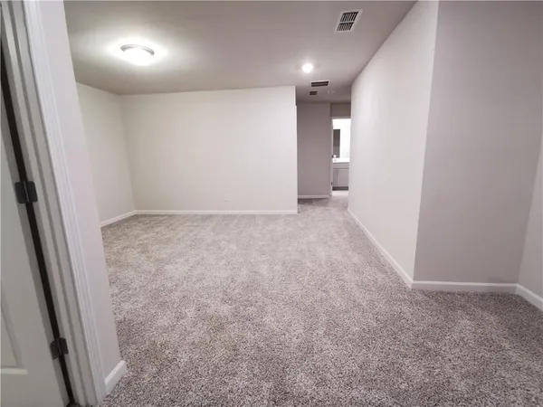 an empty room with an entryway