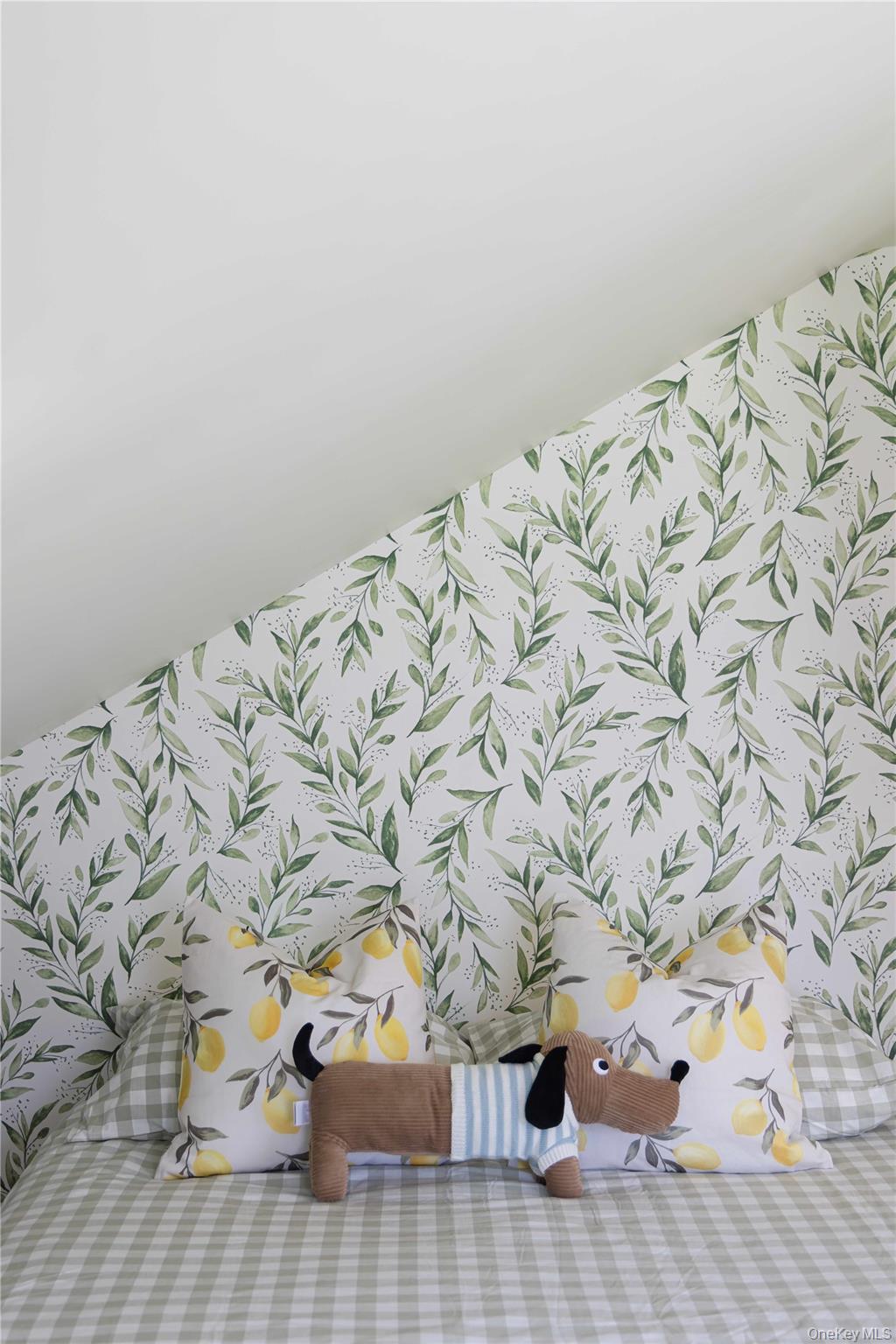 210 Middle Road Hudson, NY 12534 - Photo 37 of 42 Angled wall bedroom featuring botanical-patterned wallpaper