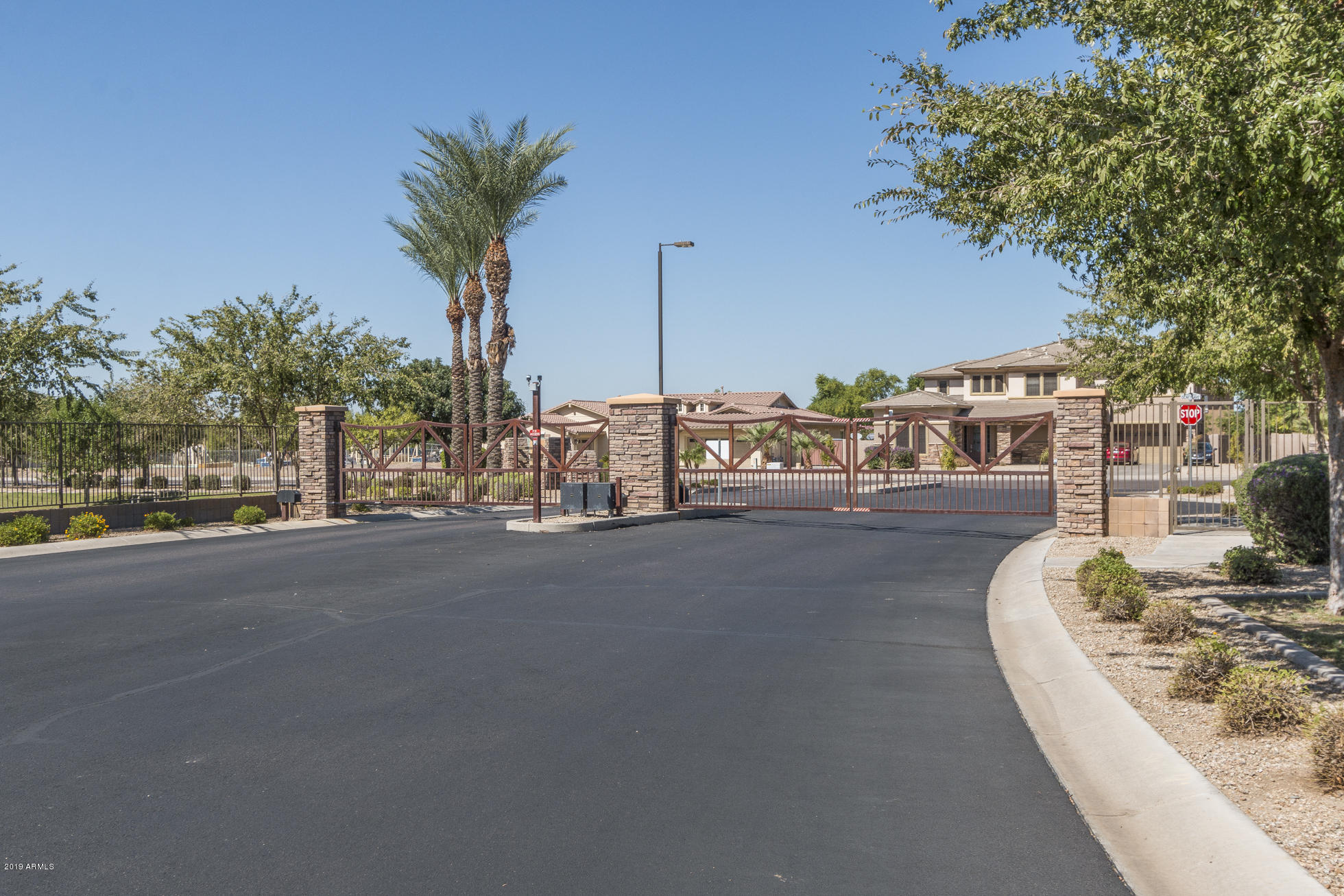 4610 West Pearce Road Laveen, AZ 85339 - Photo 25 of 26 25) COMMUNITY GATE
