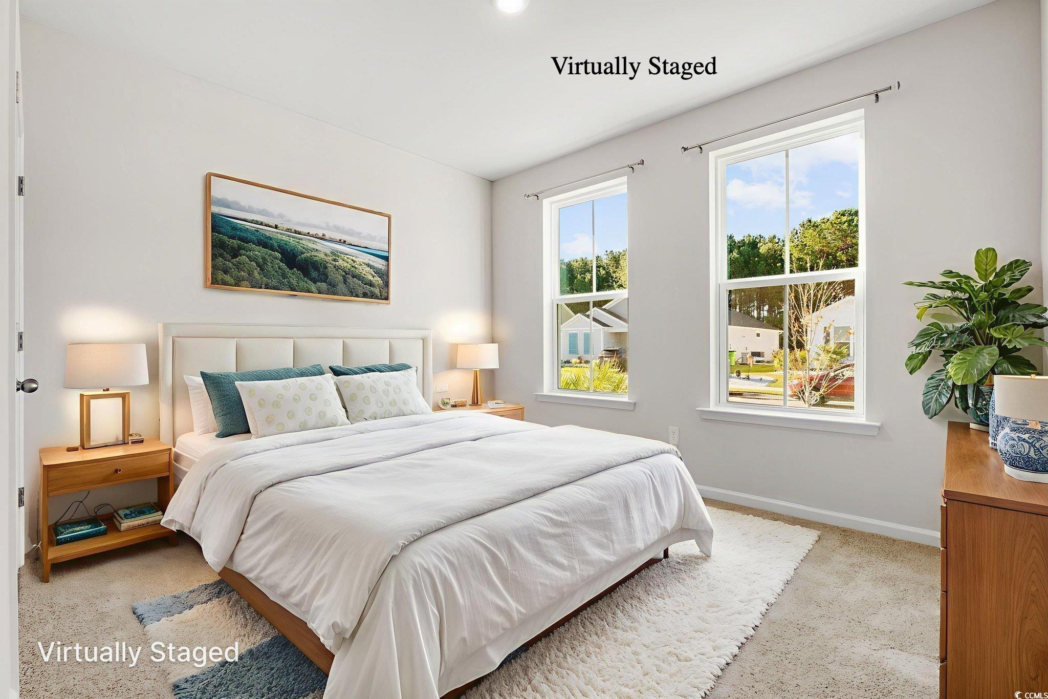 453 Kapalua Loop Little River, SC 29566 - Photo 13 of 27 Carpeted bedroom featuring baseboards