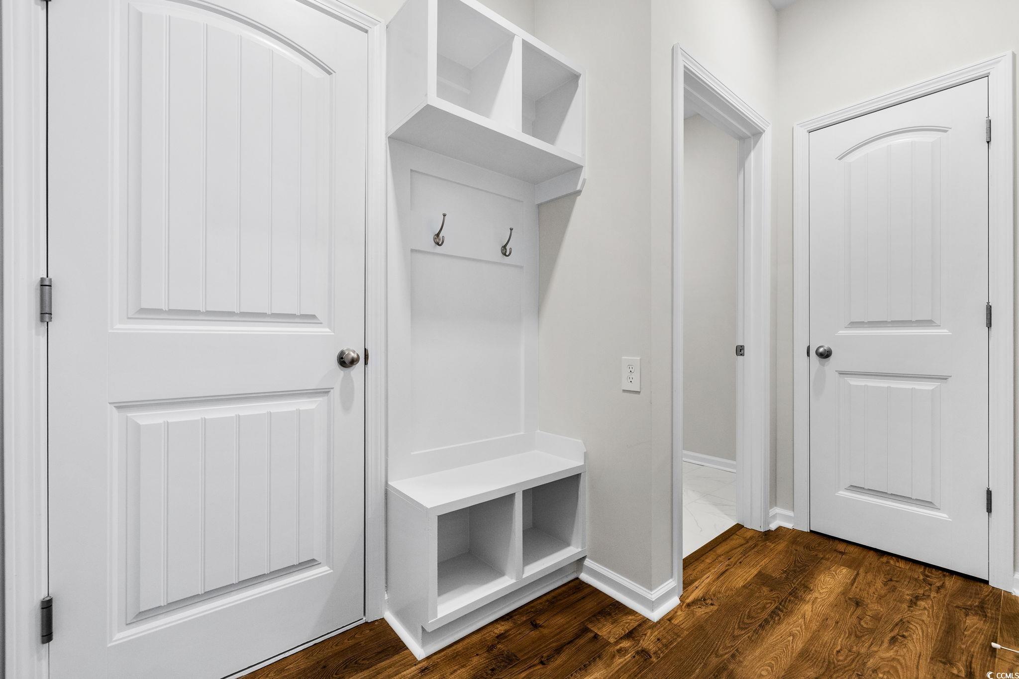 453 Kapalua Loop Little River, SC 29566 - Photo 17 of 27 Mudroom with dark wood-type flooring and baseboards