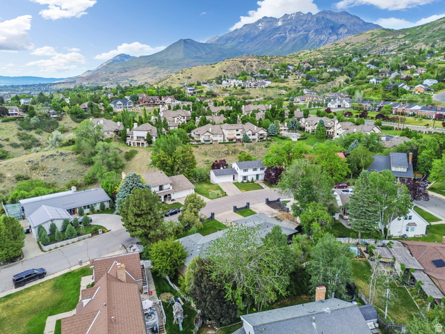 4150 Dover Lane Provo, UT 84604 - Photo 44 of 44 Residential neighborhood featuring varied architectural styles and mature landscaping, with a prominent mountain backdrop