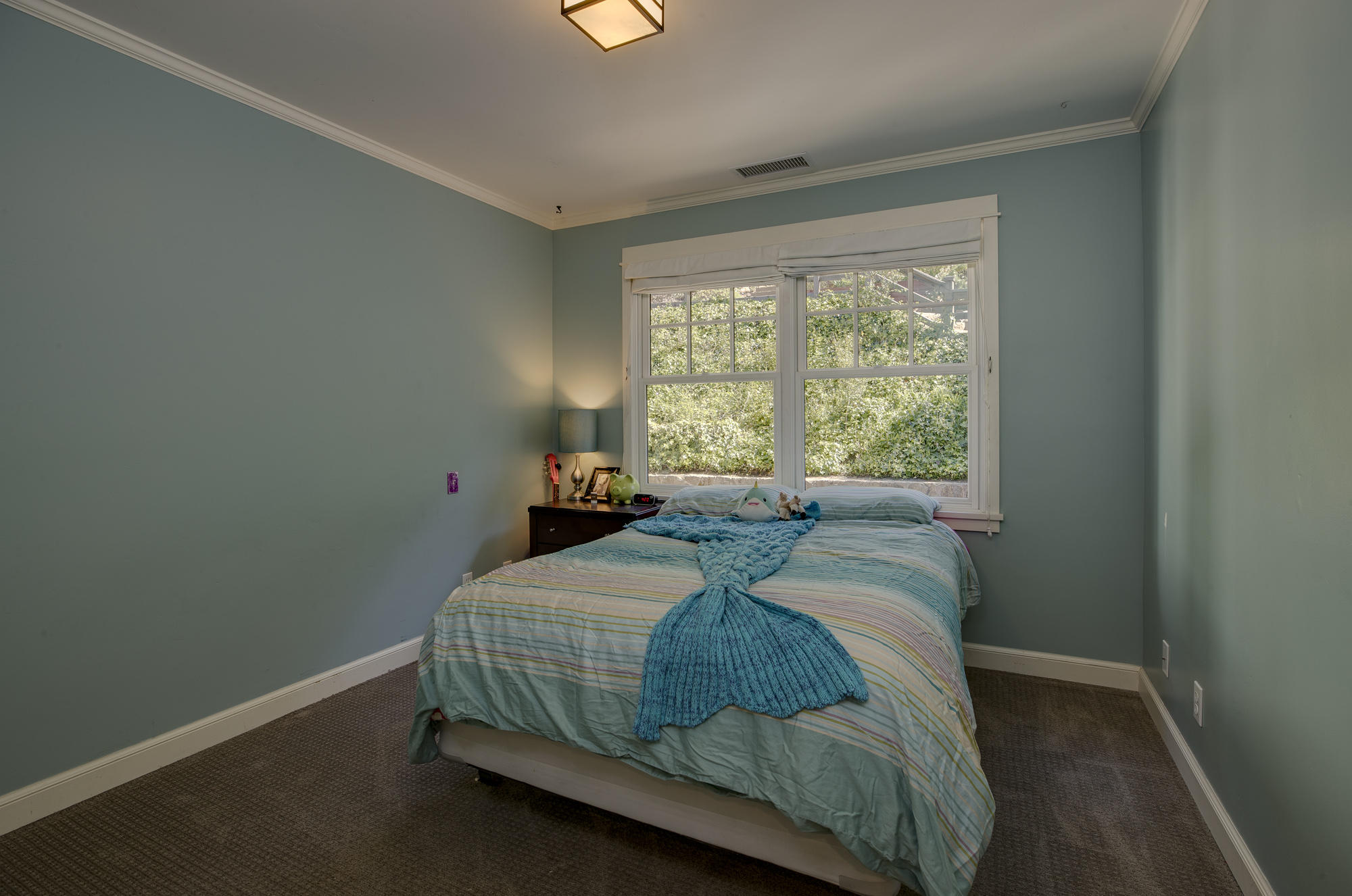 1006 Mission Ridge Road Santa Barbara, CA 93103 - Photo 10 of 21 a bedroom with a bed and a window