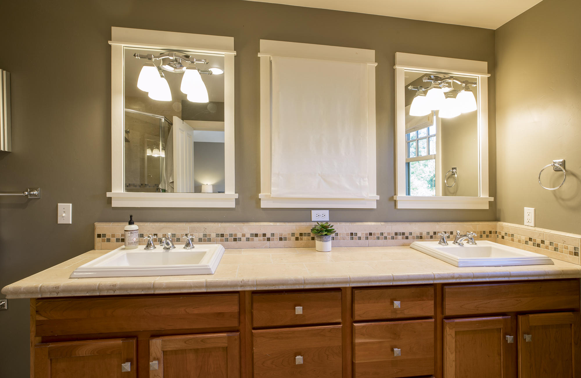 1006 Mission Ridge Road Santa Barbara, CA 93103 - Photo 8 of 21 a bathroom with a sink and a mirror