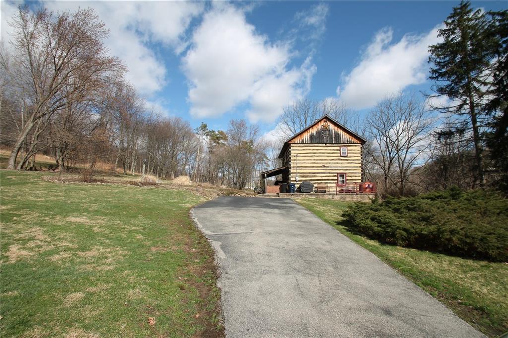 104 Sutherland Road Jeannette, PA 15644 - Photo 2 of 23 driveway leading up to home.
