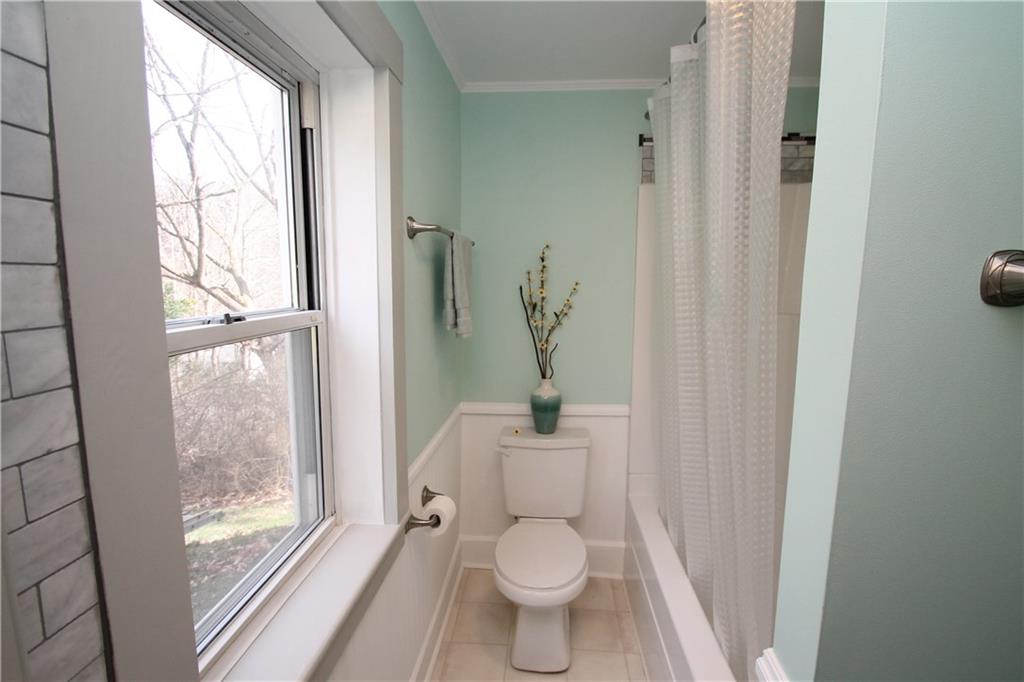 104 Sutherland Road Jeannette, PA 15644 - Photo 14 of 23 toliet and shower in the first floor bathroom