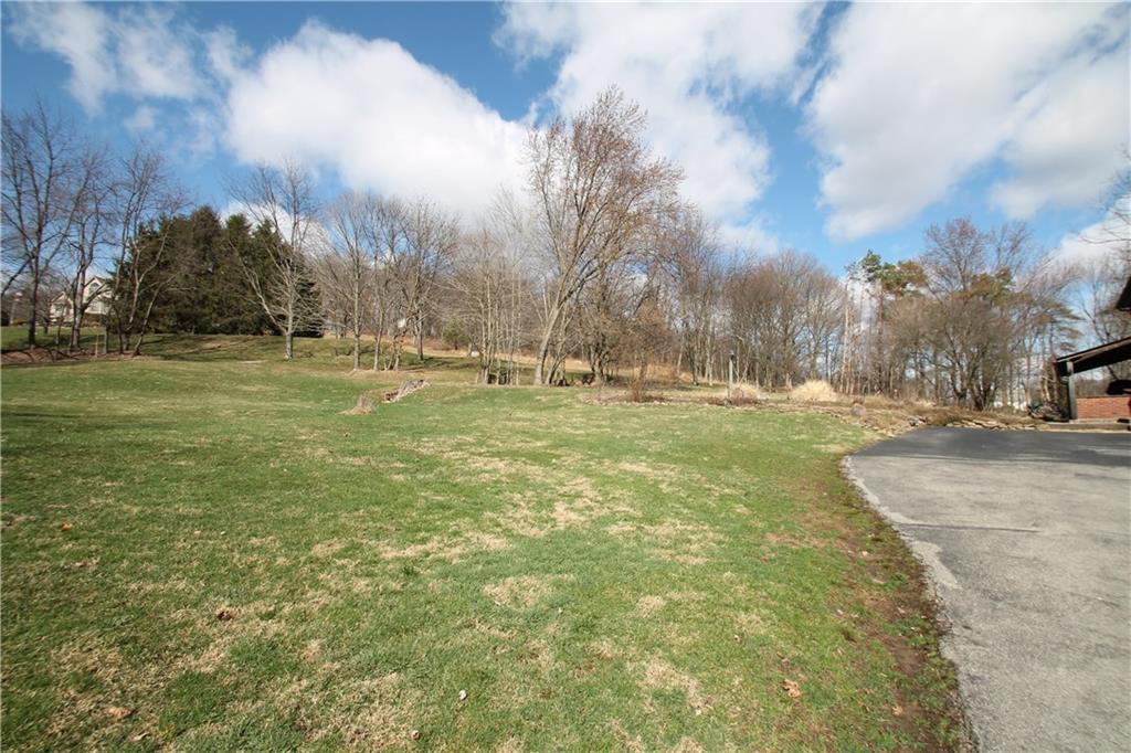 104 Sutherland Road Jeannette, PA 15644 - Photo 3 of 23 land in front of the house.
