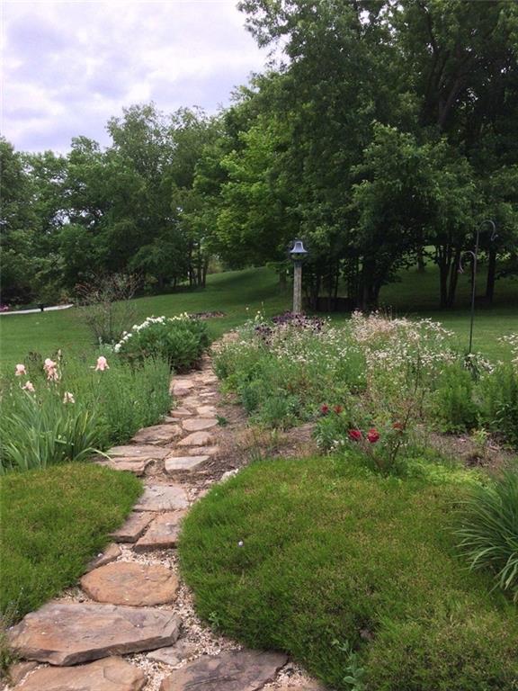 104 Sutherland Road Jeannette, PA 15644 - Photo 23 of 23 flower garden in the summer