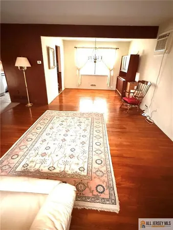 a view of kitchen with dining area and glass door