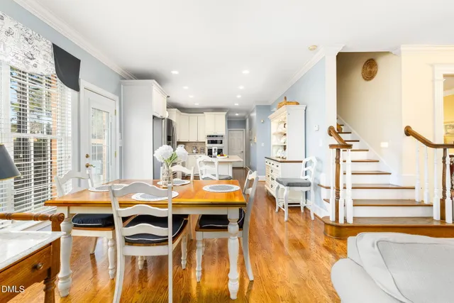 a room with musical instrument pool table and windows