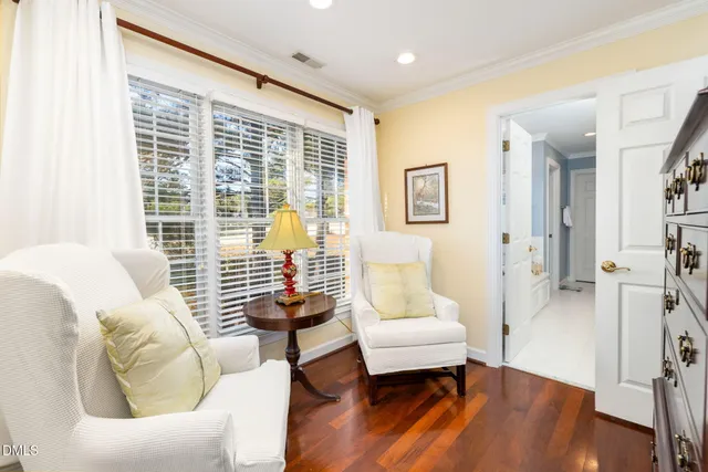 a view of a room with a window and a shower