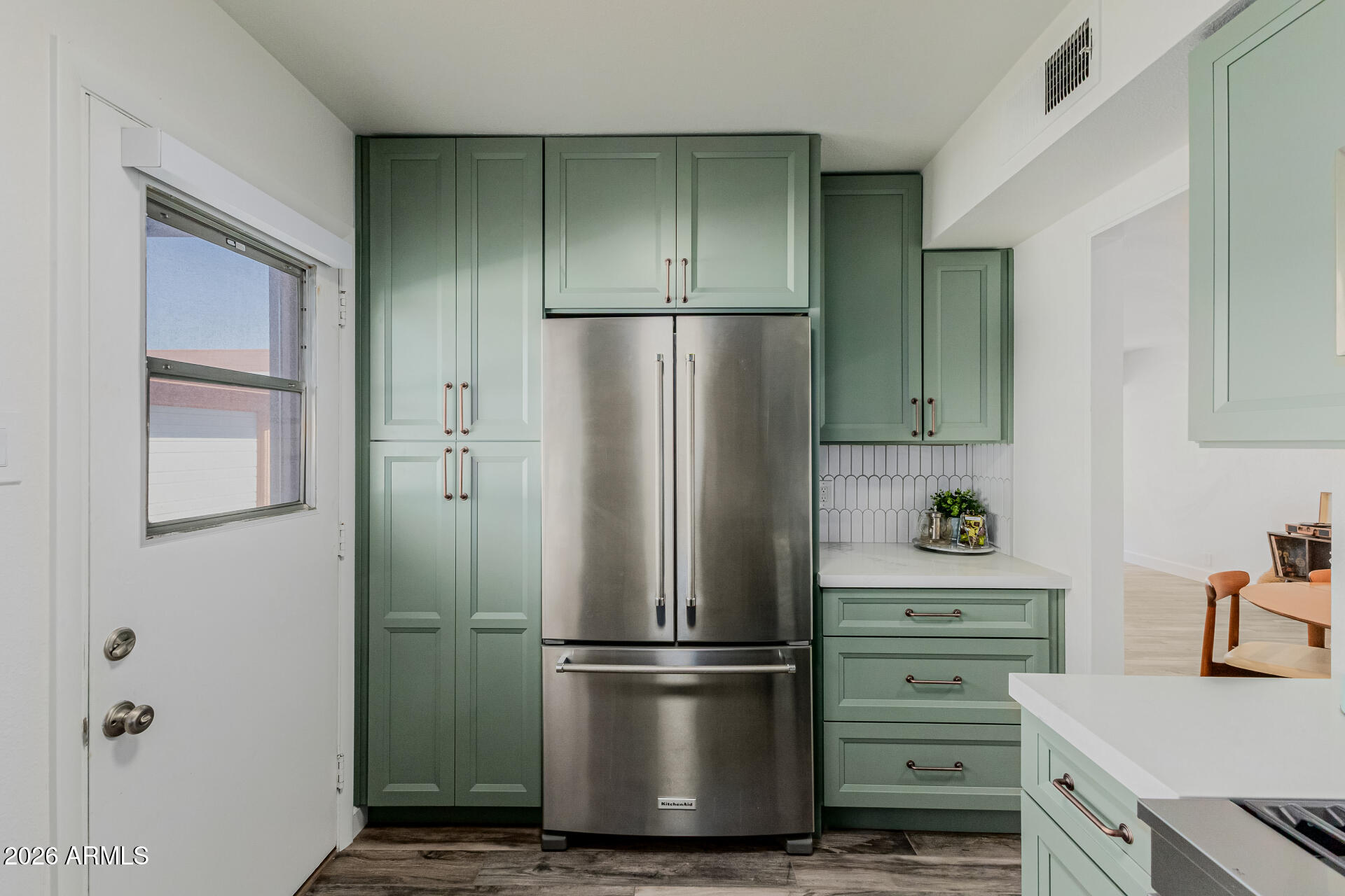 160 East Coronado Road, Unit 58 Phoenix, AZ 85004 - Photo 15 of 50 a kitchen with cabinets and stainless steel appliances