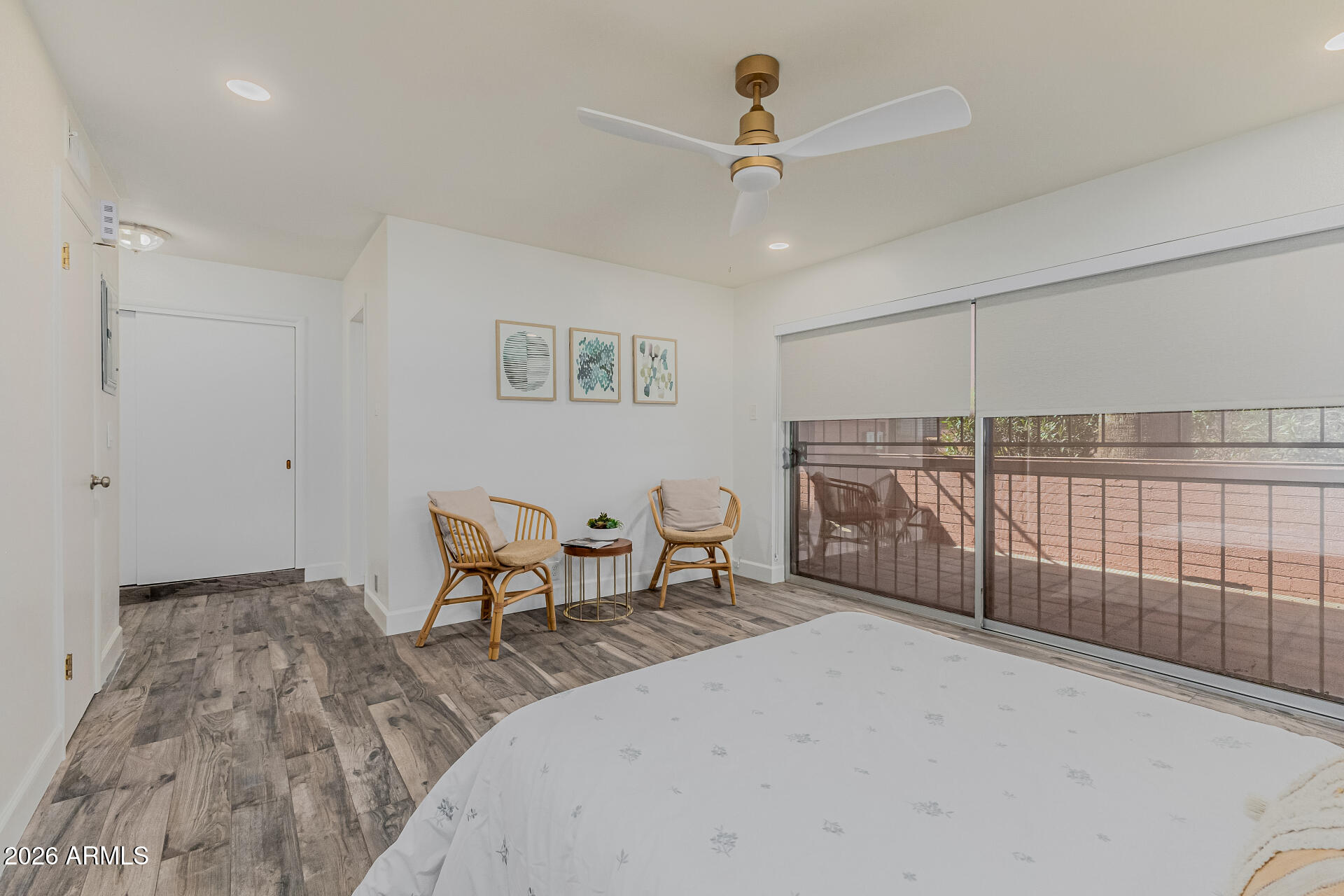 160 East Coronado Road, Unit 58 Phoenix, AZ 85004 - Photo 19 of 50 a bedroom with furniture and a ceiling fan