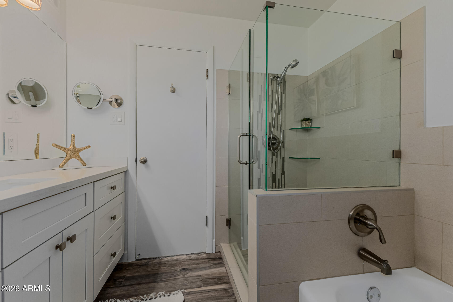 160 East Coronado Road, Unit 58 Phoenix, AZ 85004 - Photo 22 of 50 a bathroom with a shower sink and mirror