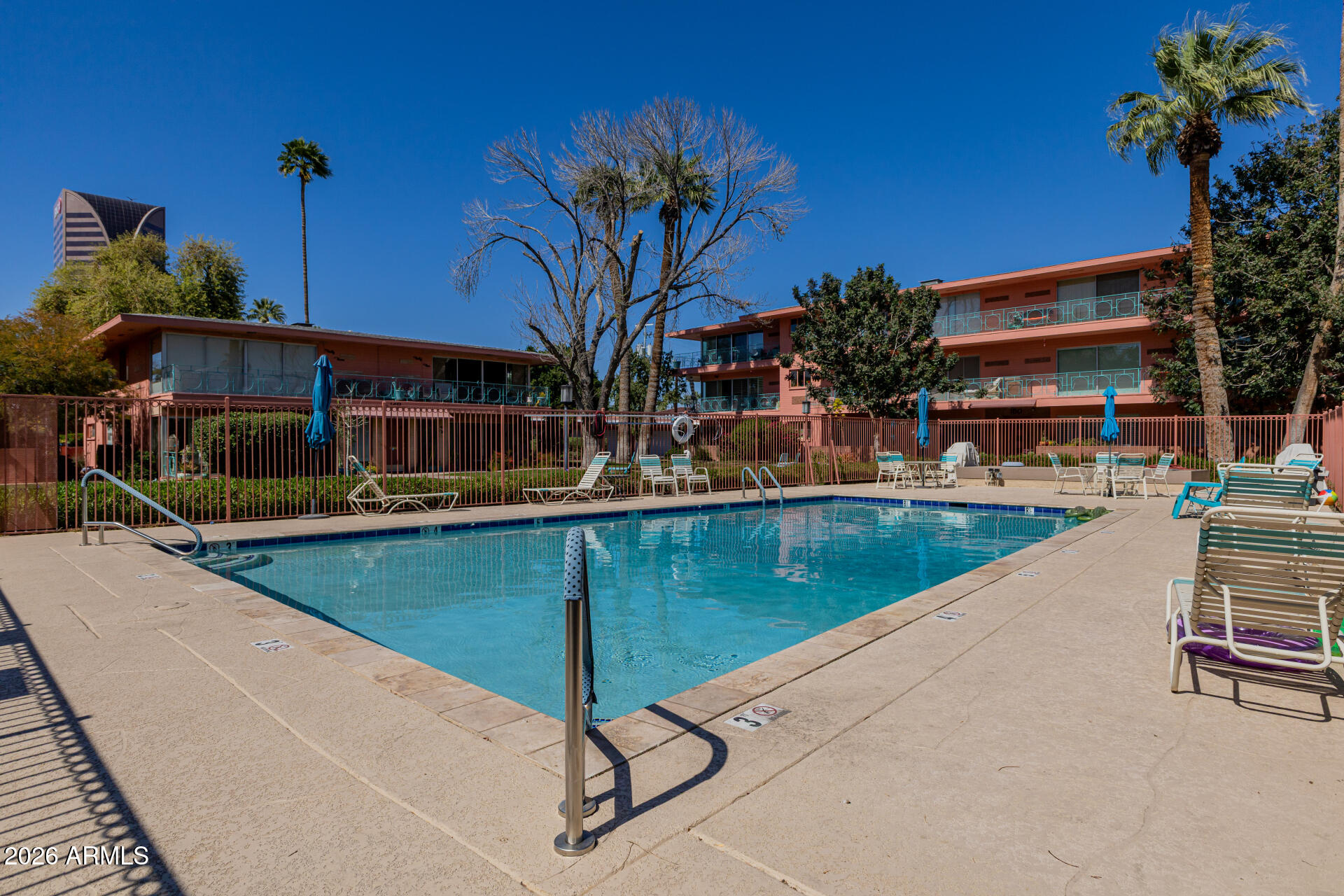 160 East Coronado Road, Unit 58 Phoenix, AZ 85004 - Photo 32 of 50 a view of a swimming pool with a patio