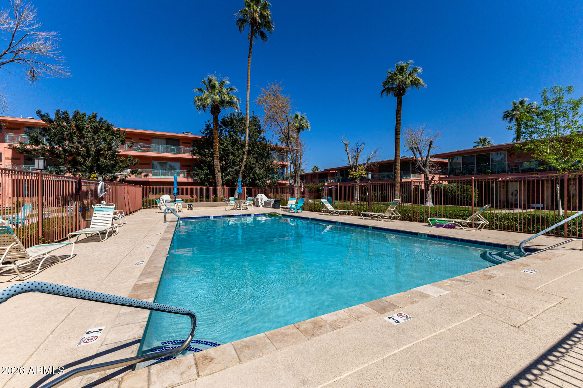 160 East Coronado Road, Unit 58 Phoenix, AZ 85004 - Photo 34 of 50 a view of a house with swimming pool