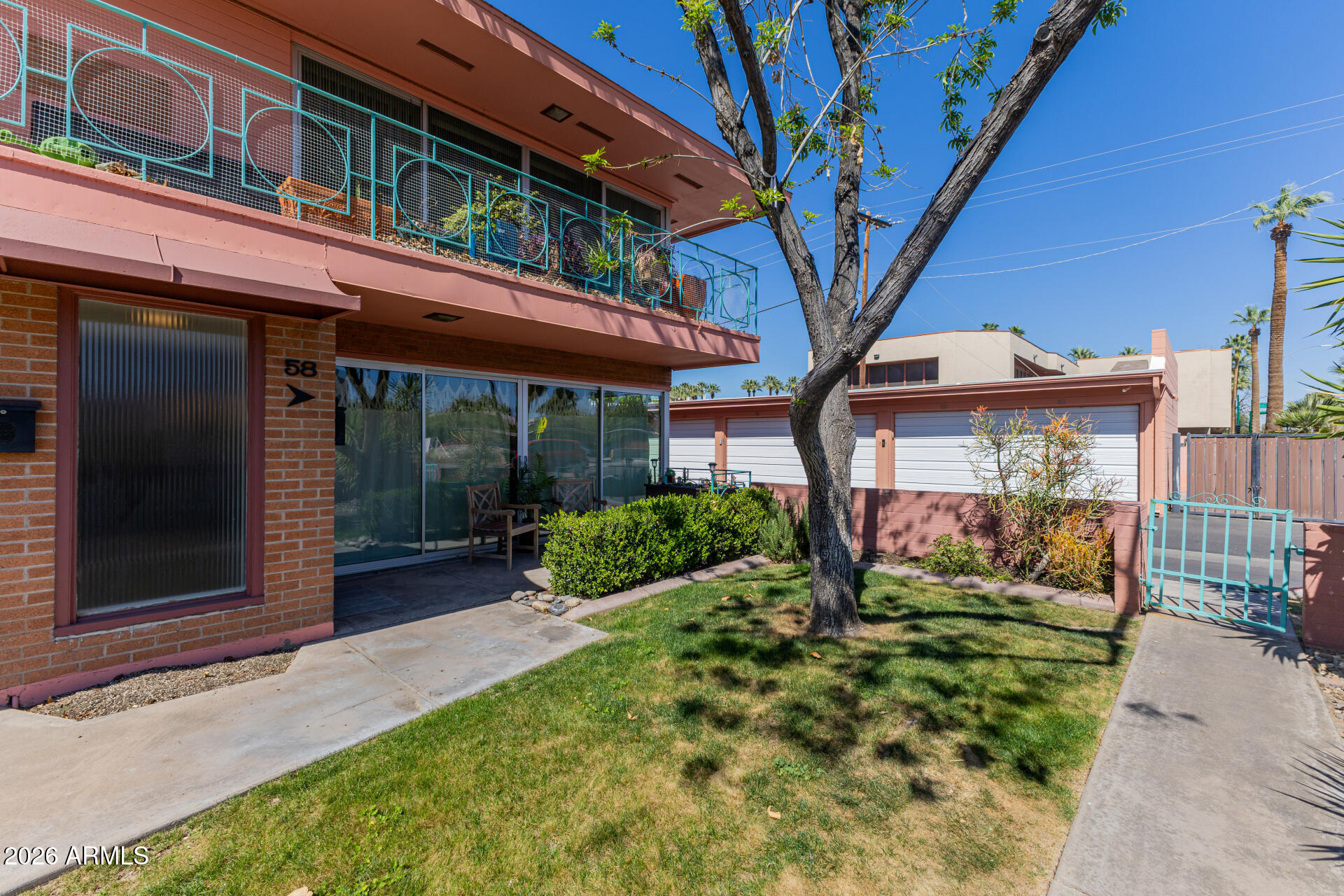160 East Coronado Road, Unit 58 Phoenix, AZ 85004 - Photo 38 of 50 a front view of a house with garden