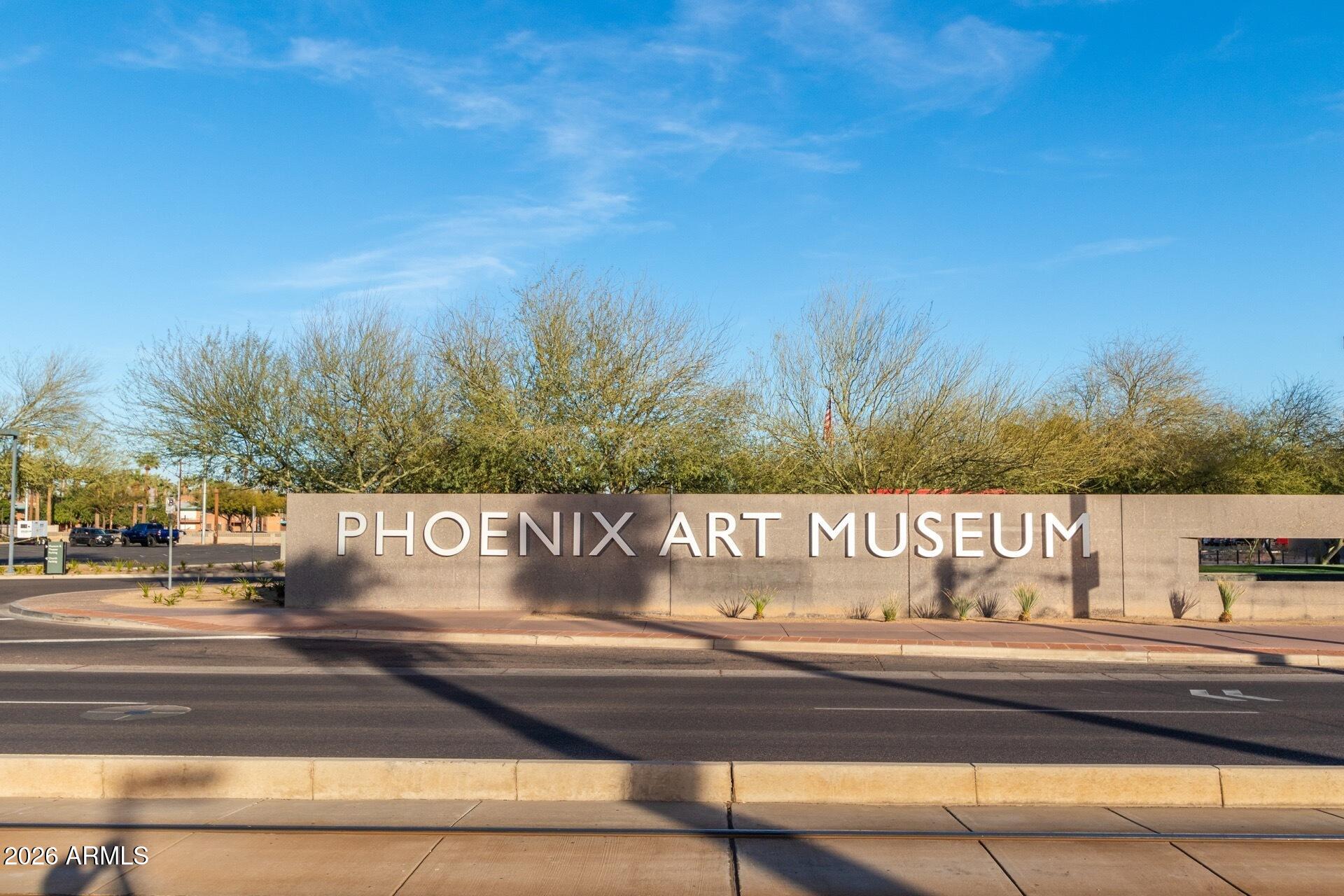 160 East Coronado Road, Unit 58 Phoenix, AZ 85004 - Photo 45 of 50 a view of swimming pool with a yard and large tree