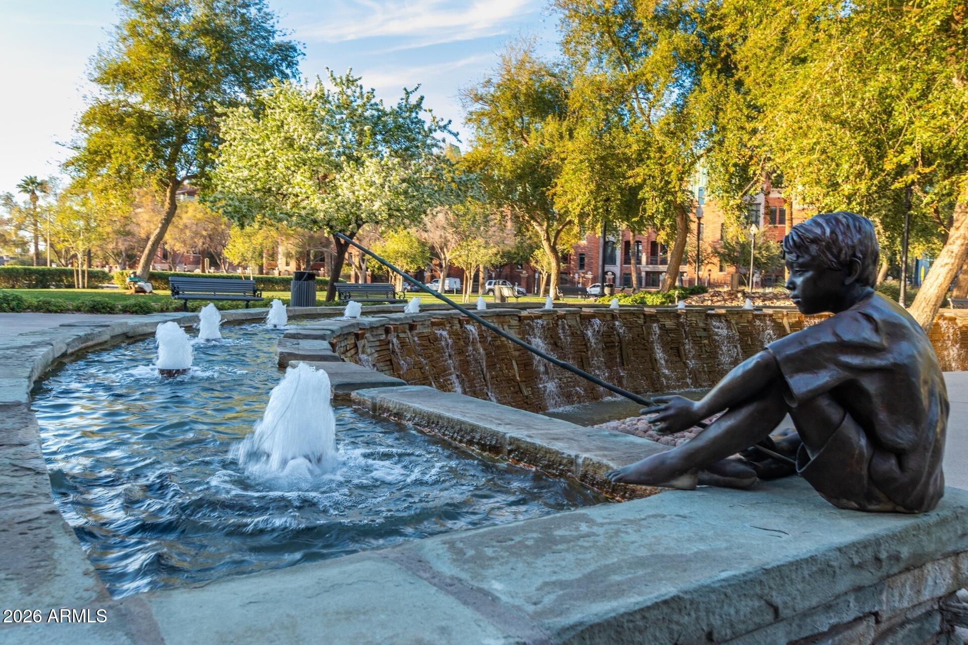 160 East Coronado Road, Unit 58 Phoenix, AZ 85004 - Photo 48 of 50 a view of a swimming pool with a sitting space
