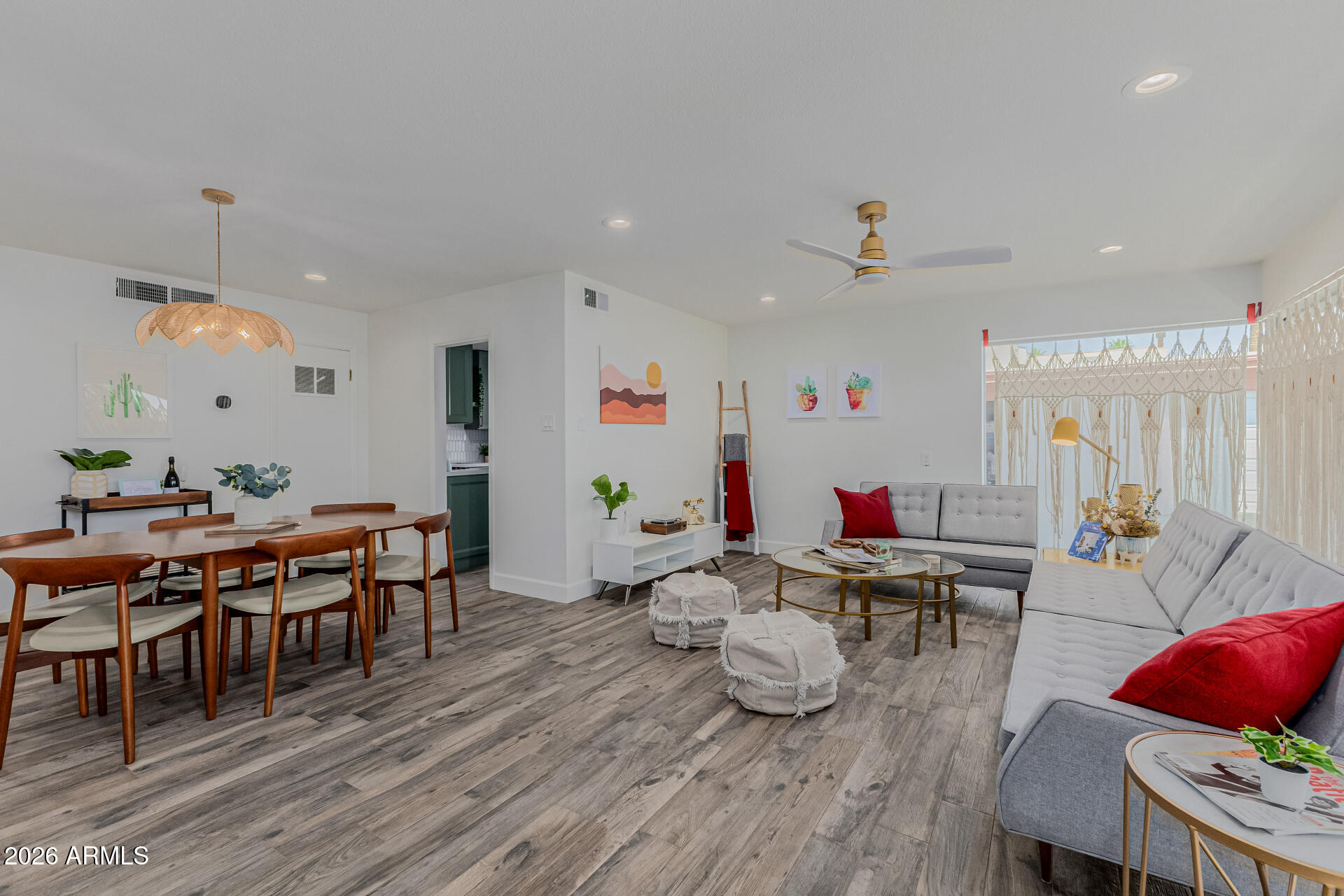 160 East Coronado Road, Unit 58 Phoenix, AZ 85004 - Photo 5 of 50 a room with furniture a wooden floor and a chandelier