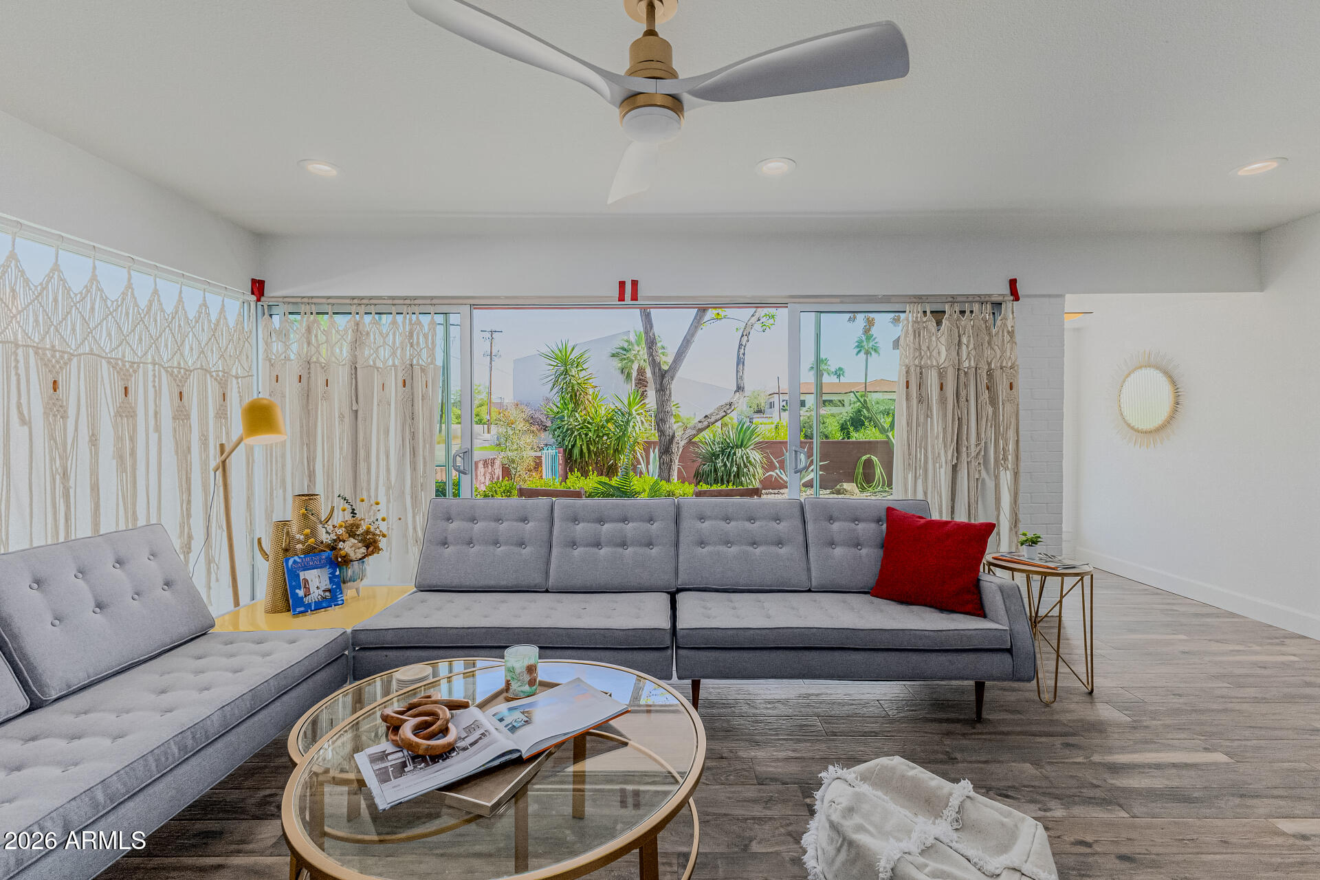160 East Coronado Road, Unit 58 Phoenix, AZ 85004 - Photo 8 of 50 a living room with furniture and a floor to ceiling window