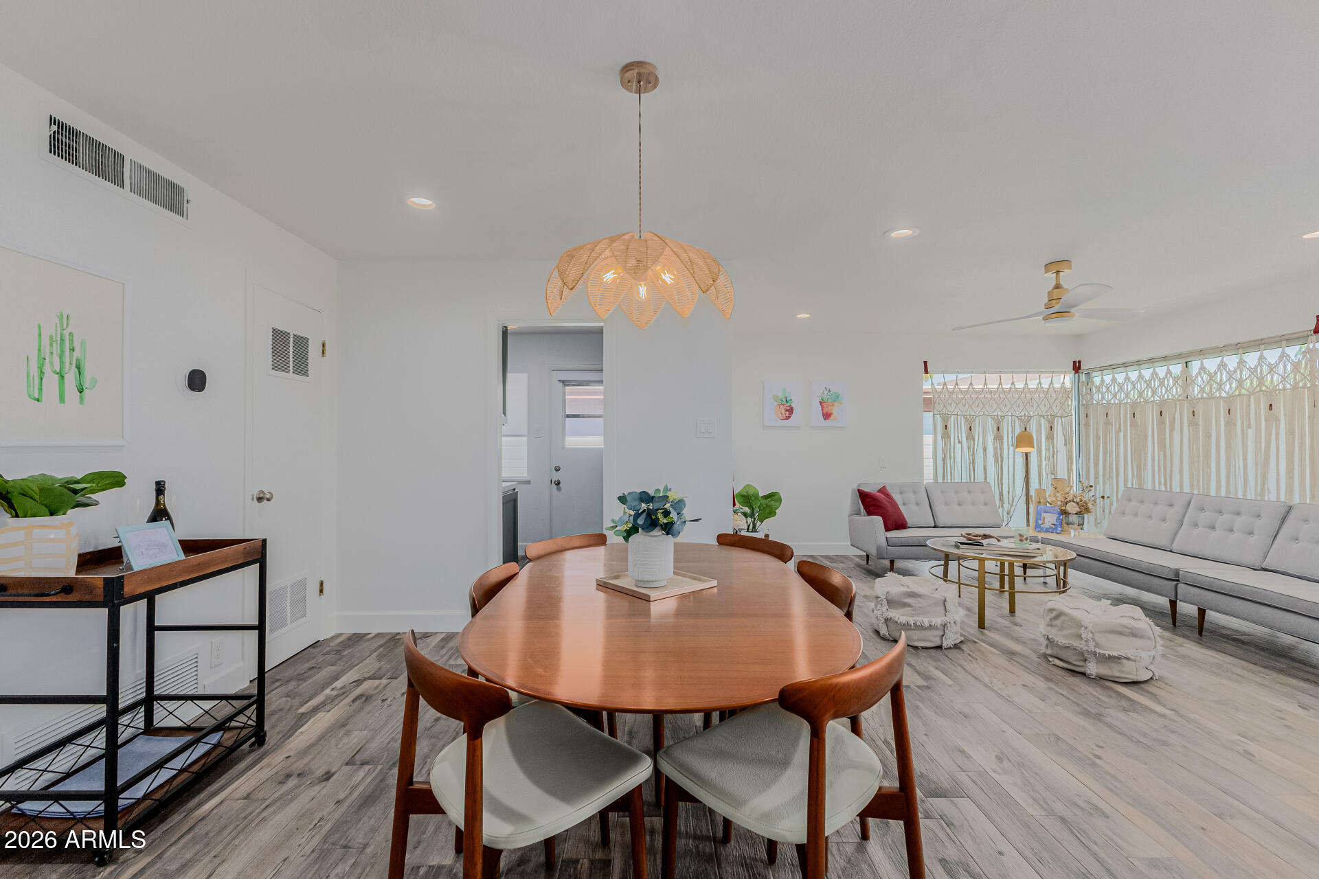 160 East Coronado Road, Unit 58 Phoenix, AZ 85004 - Photo 10 of 50 a view of a dining room with furniture and wooden floor