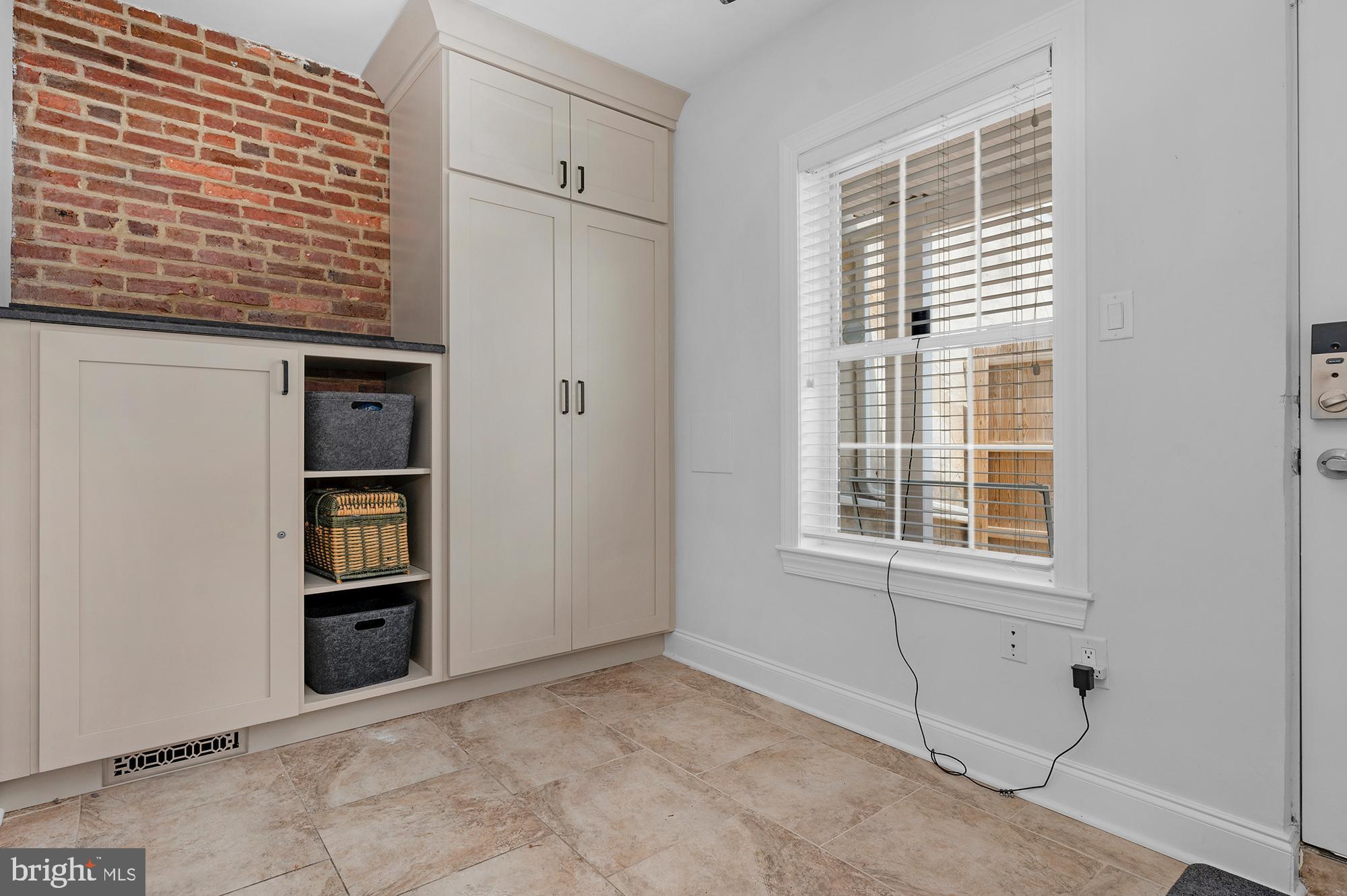 1329 South Charles Street Baltimore, MD 21230 - Photo 11 of 30 a view of an empty room with a window
