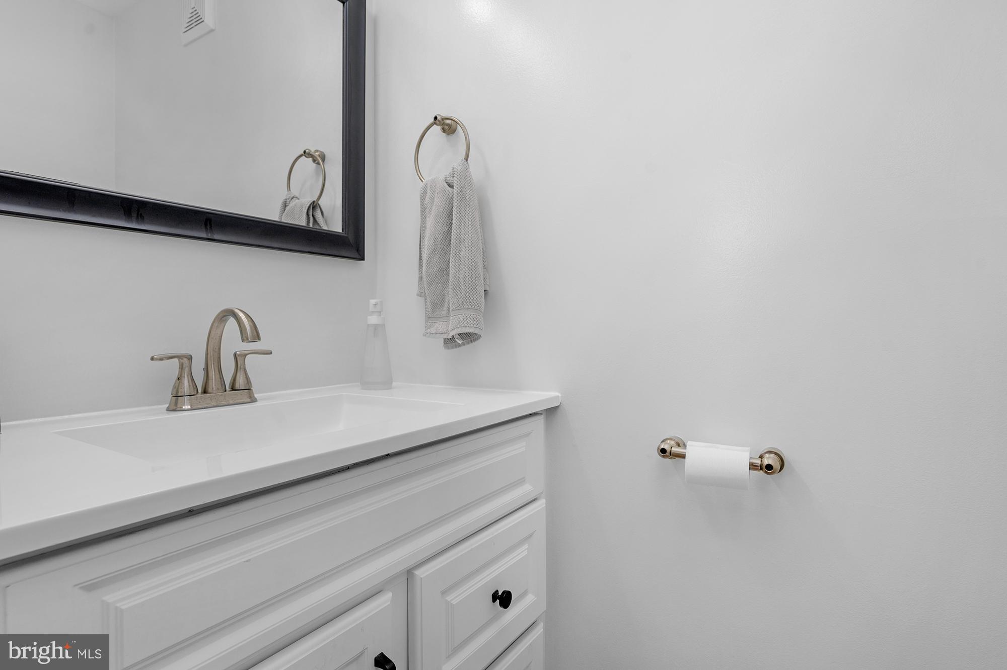 1329 South Charles Street Baltimore, MD 21230 - Photo 12 of 30 a close view of sink and tap