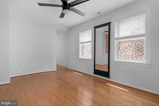 an empty room with windows