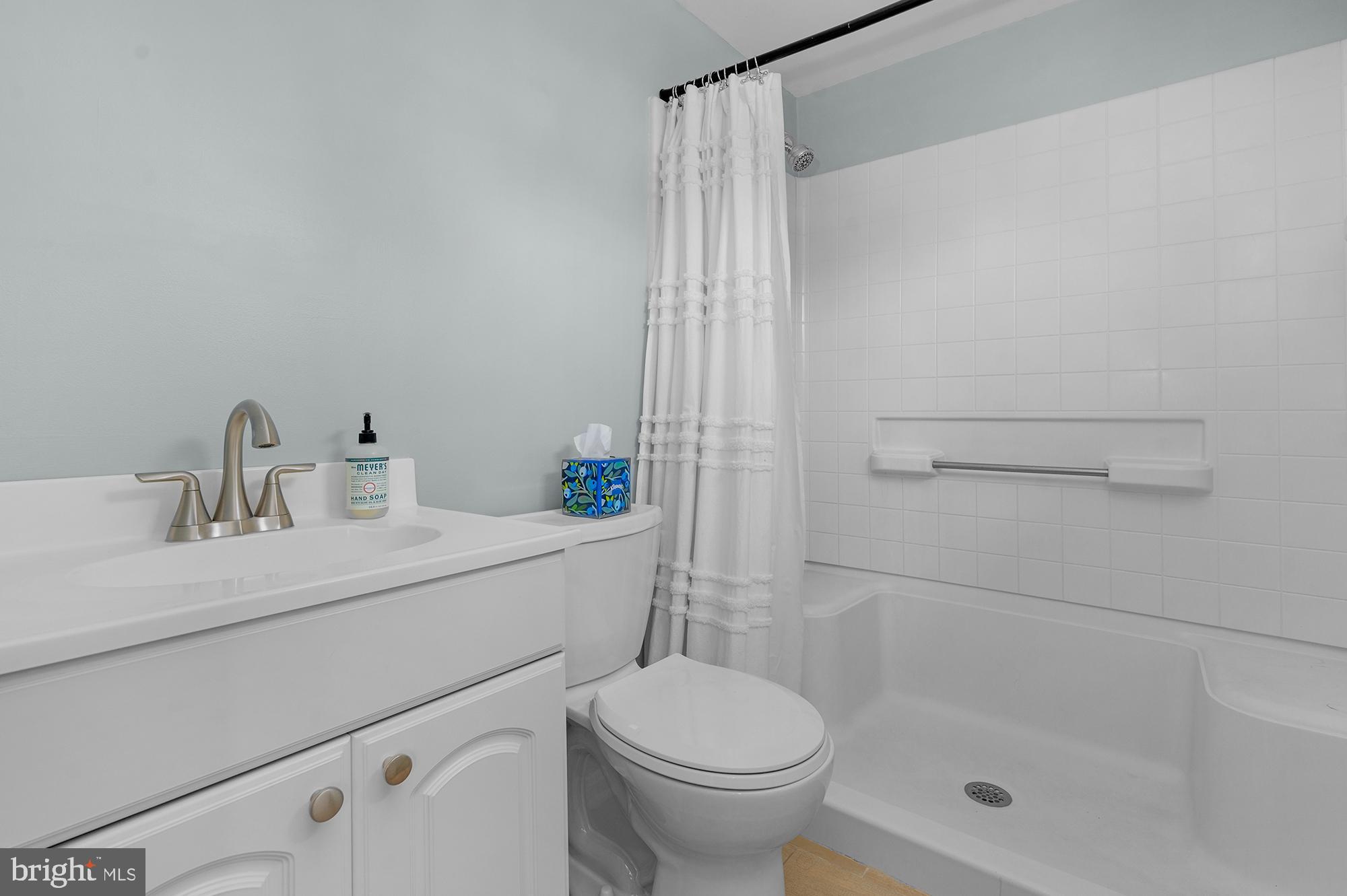 1329 South Charles Street Baltimore, MD 21230 - Photo 23 of 30 a bathroom with a sink toilet and shower