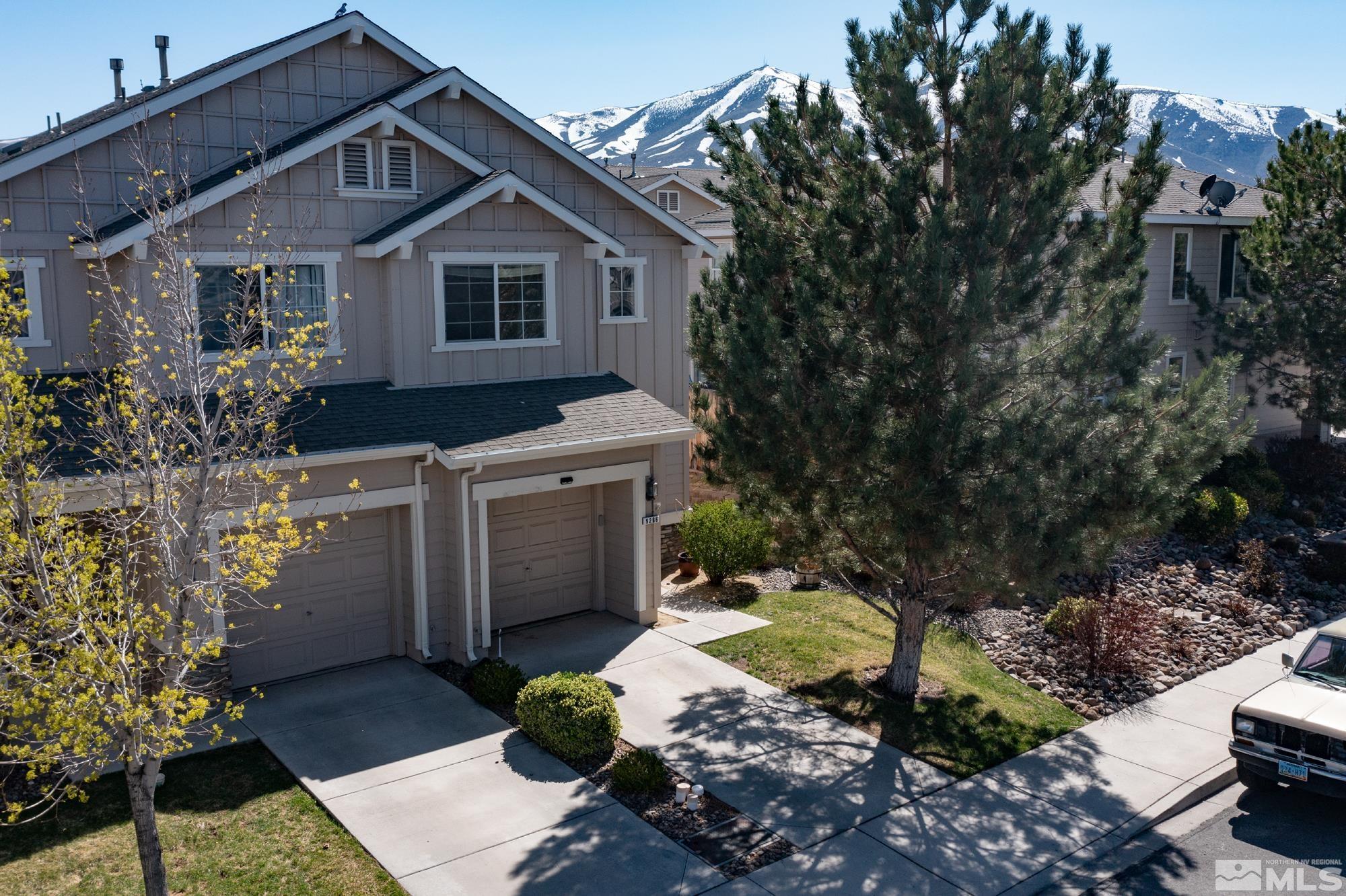 9266 Running Dog Circle Reno, NV 89506 - Photo 1 of 35 a view of a house with a yard and plants