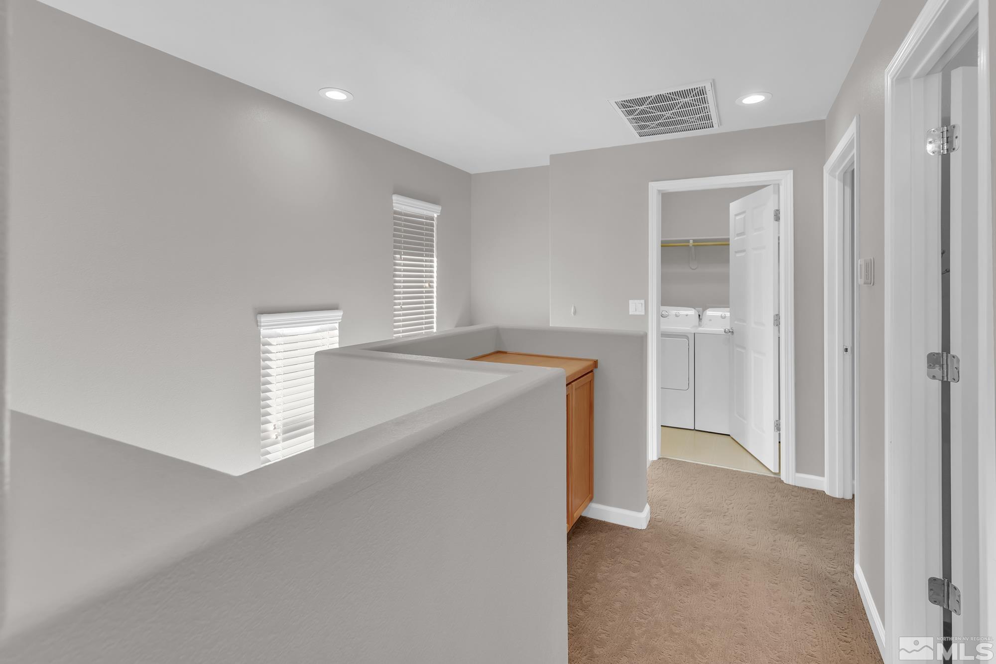 9266 Running Dog Circle Reno, NV 89506 - Photo 15 of 35 a view of a kitchen cabinets and a wooden floor