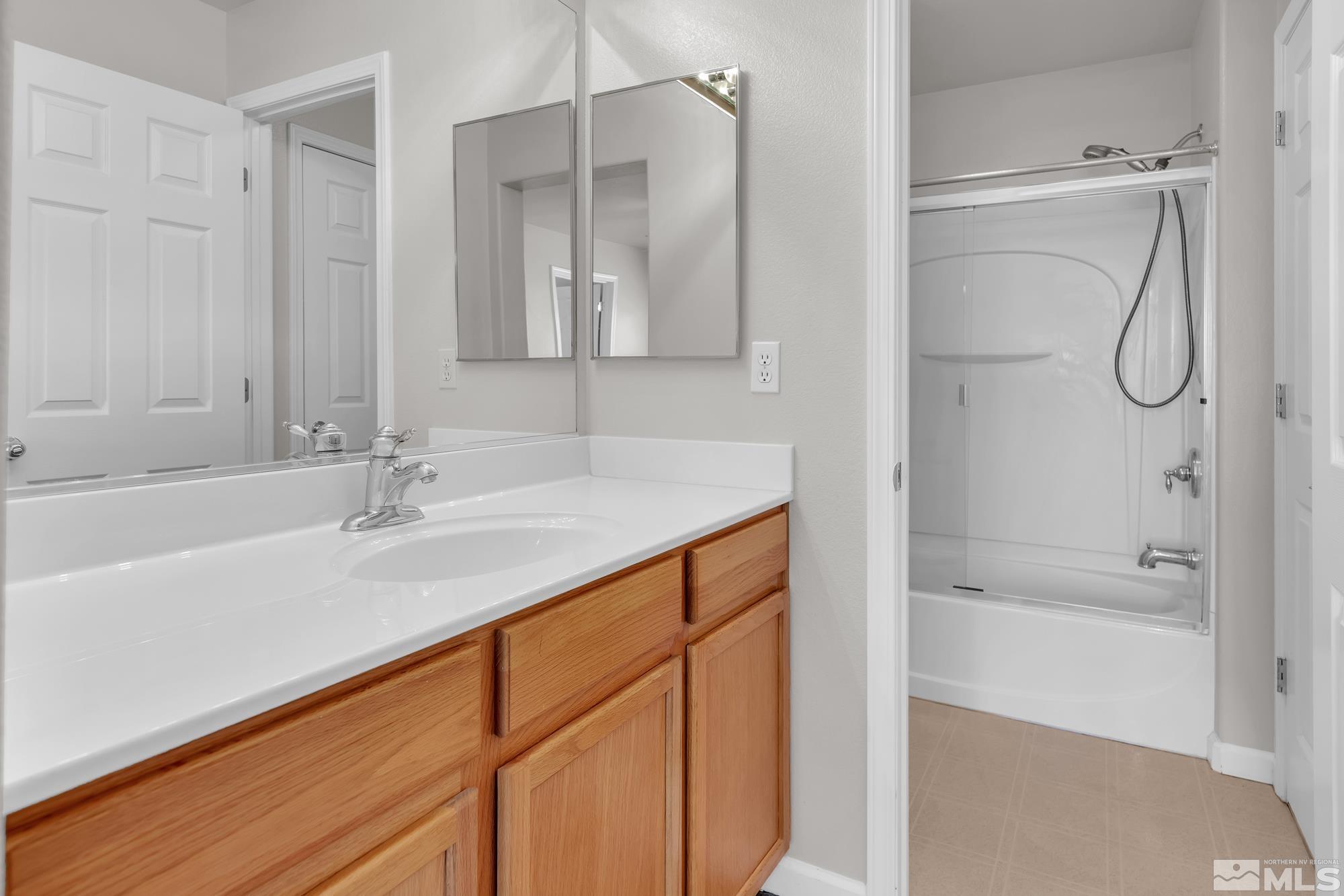 9266 Running Dog Circle Reno, NV 89506 - Photo 22 of 35 a bathroom with a sink and a bathtub