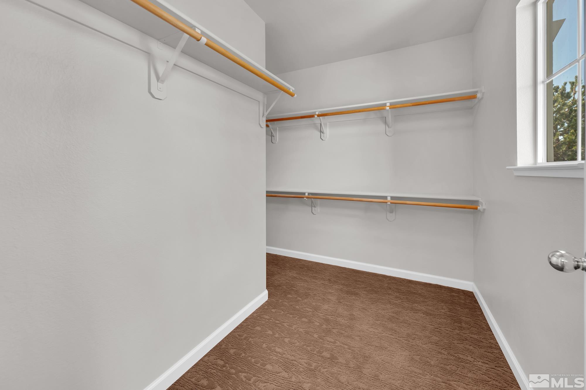 9266 Running Dog Circle Reno, NV 89506 - Photo 27 of 35 a view of an empty walk in closet