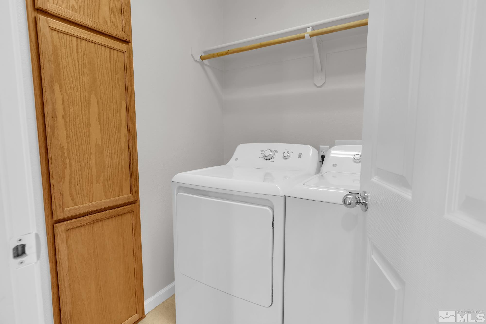 9266 Running Dog Circle Reno, NV 89506 - Photo 28 of 35 a utility room with dryer and washer