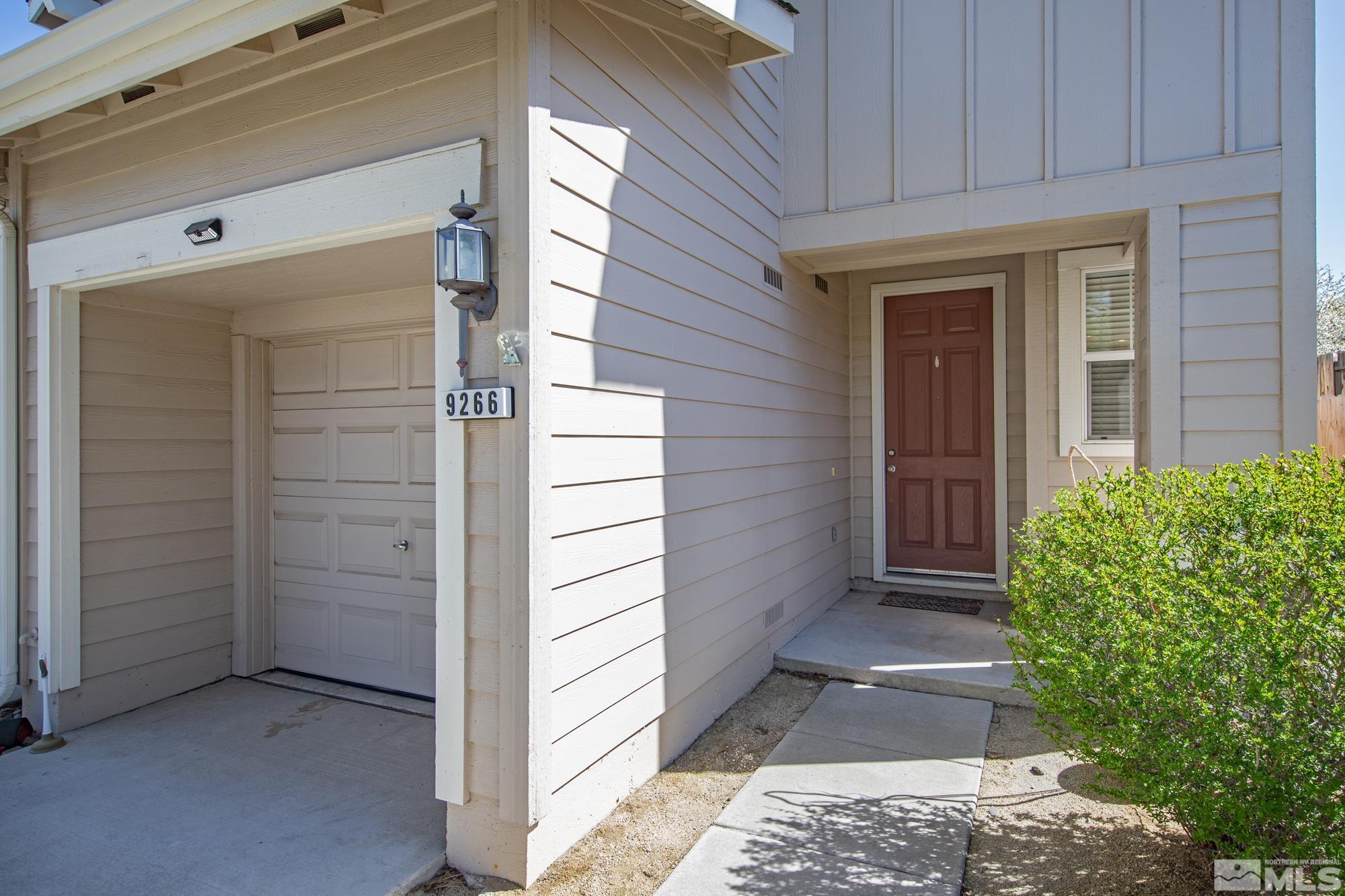 9266 Running Dog Circle Reno, NV 89506 - Photo 3 of 35 a view of front door of house