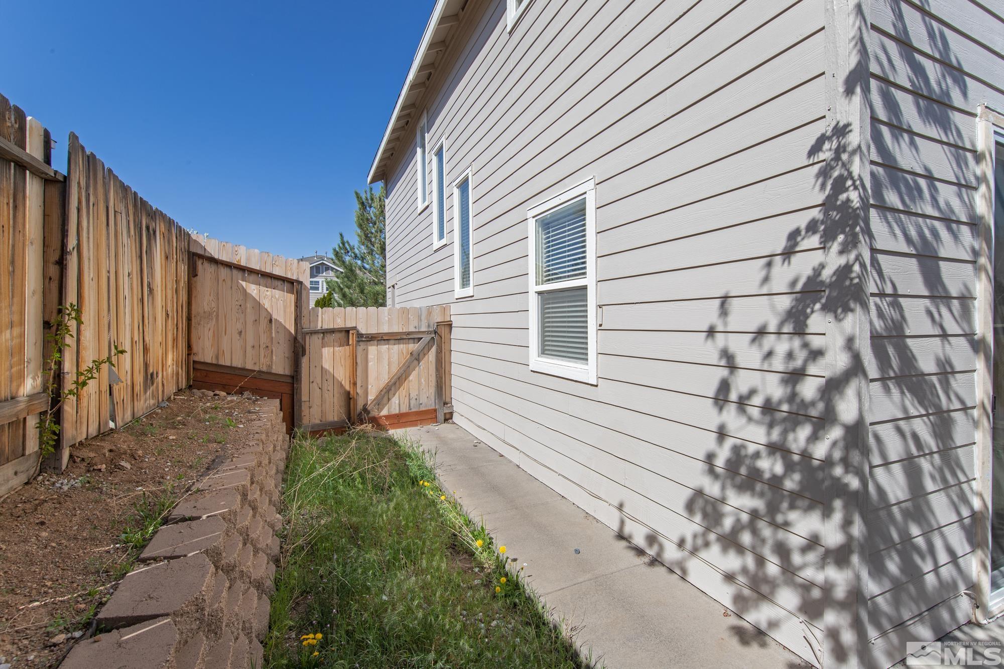 9266 Running Dog Circle Reno, NV 89506 - Photo 31 of 35 a house view with a backyard space