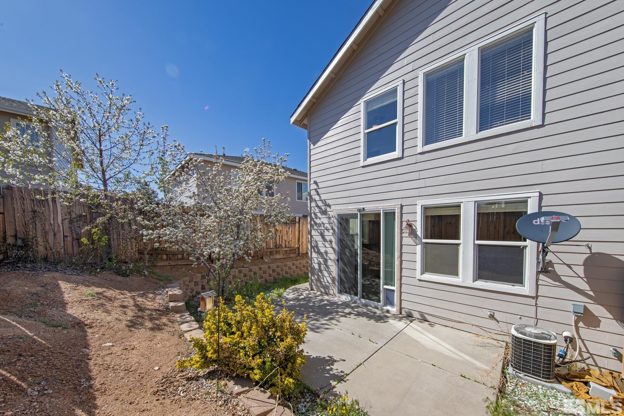 9266 Running Dog Circle Reno, NV 89506 - Photo 34 of 35 a view of a house with a yard