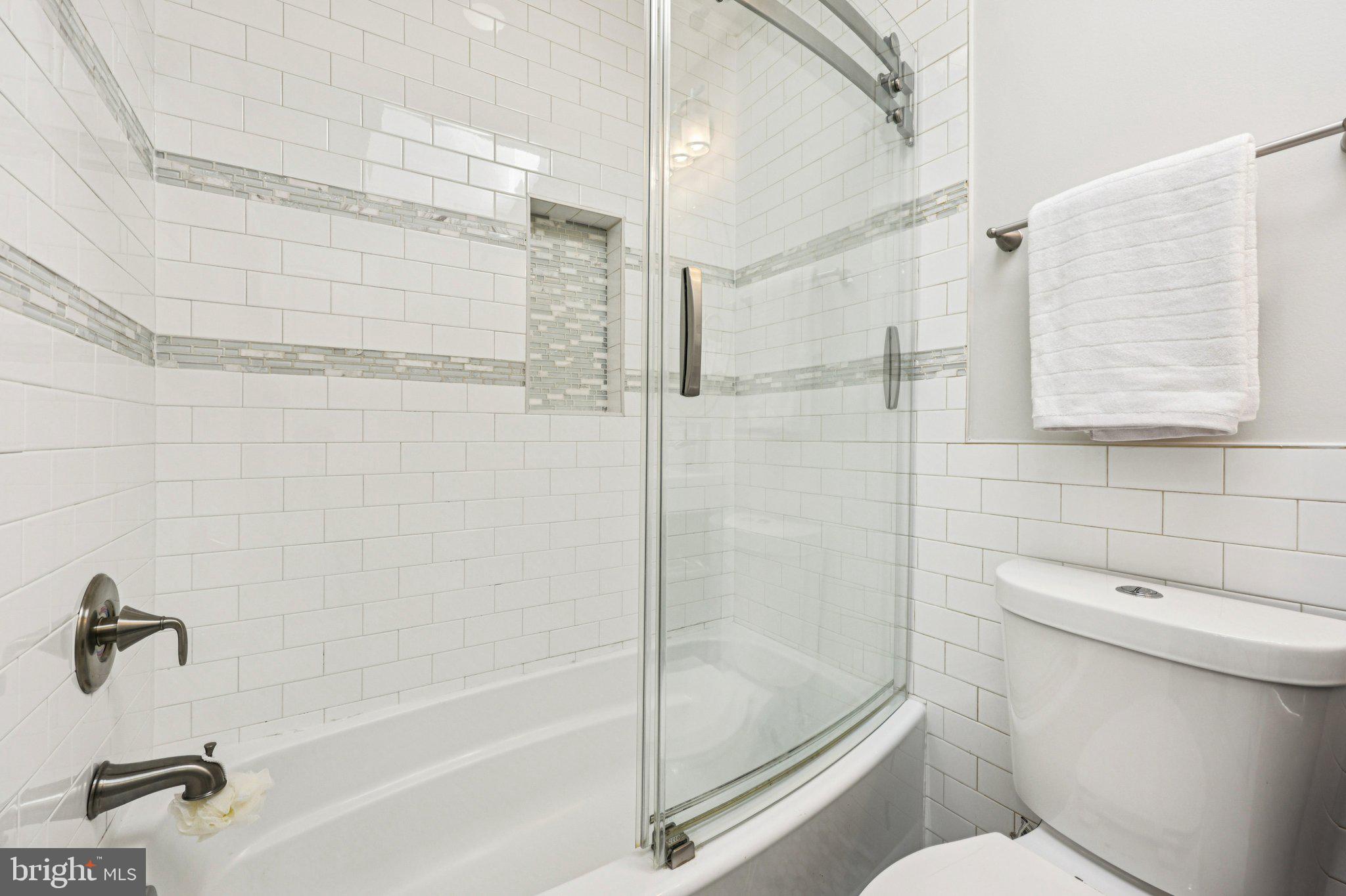 5209 5th Street Northwest Washington, DC 20011 - Photo 15 of 38 a bathroom with a shower and a toilet