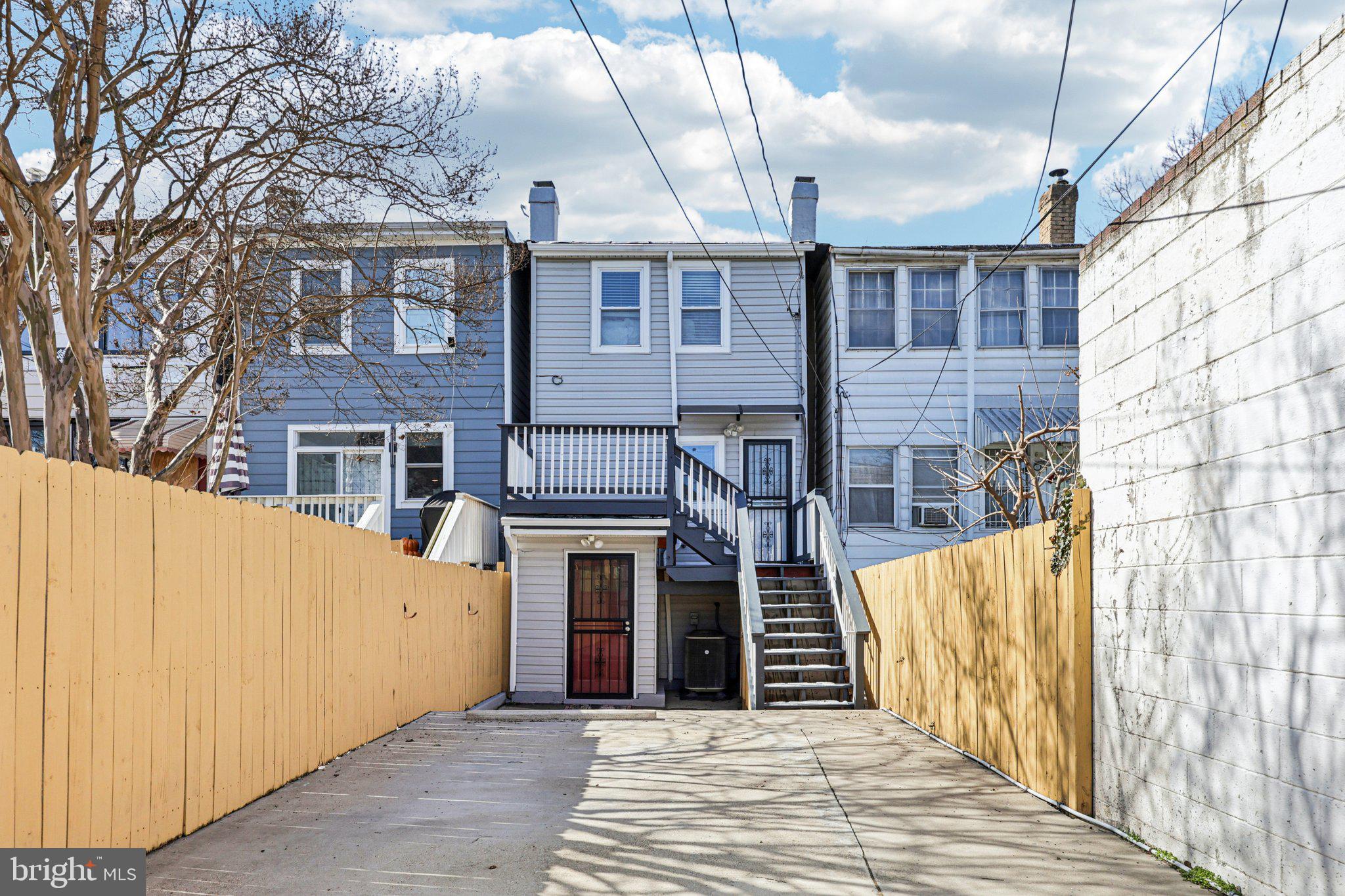 5209 5th Street Northwest Washington, DC 20011 - Photo 28 of 38 a view of a house with wooden fence